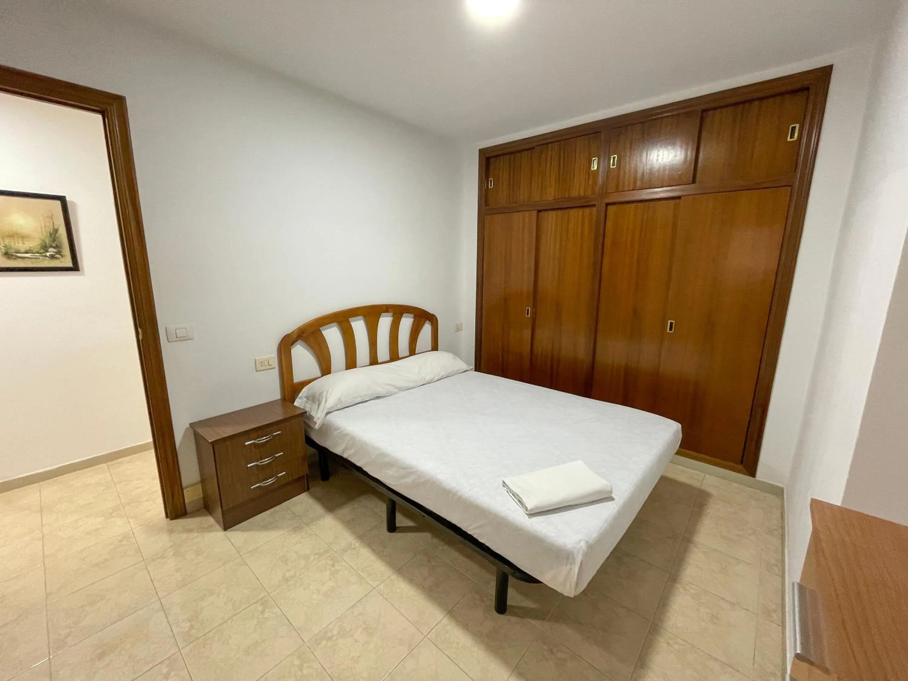 Bed in Apartamentos Neptuno Oropesa 3000