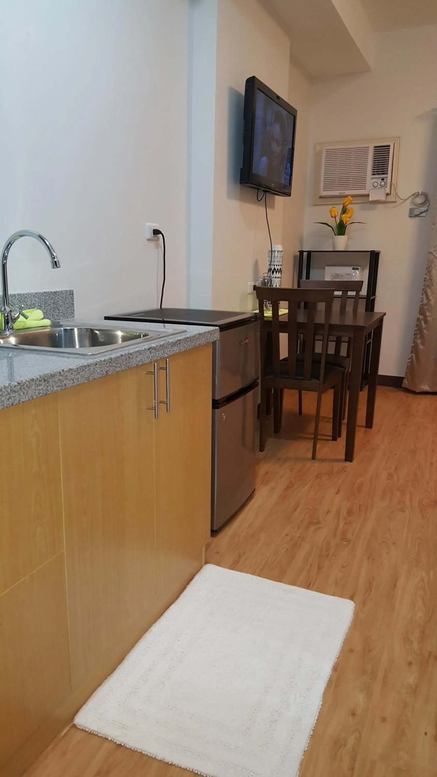 Kitchen or kitchenette in Mesaverte Residences AFS Suites