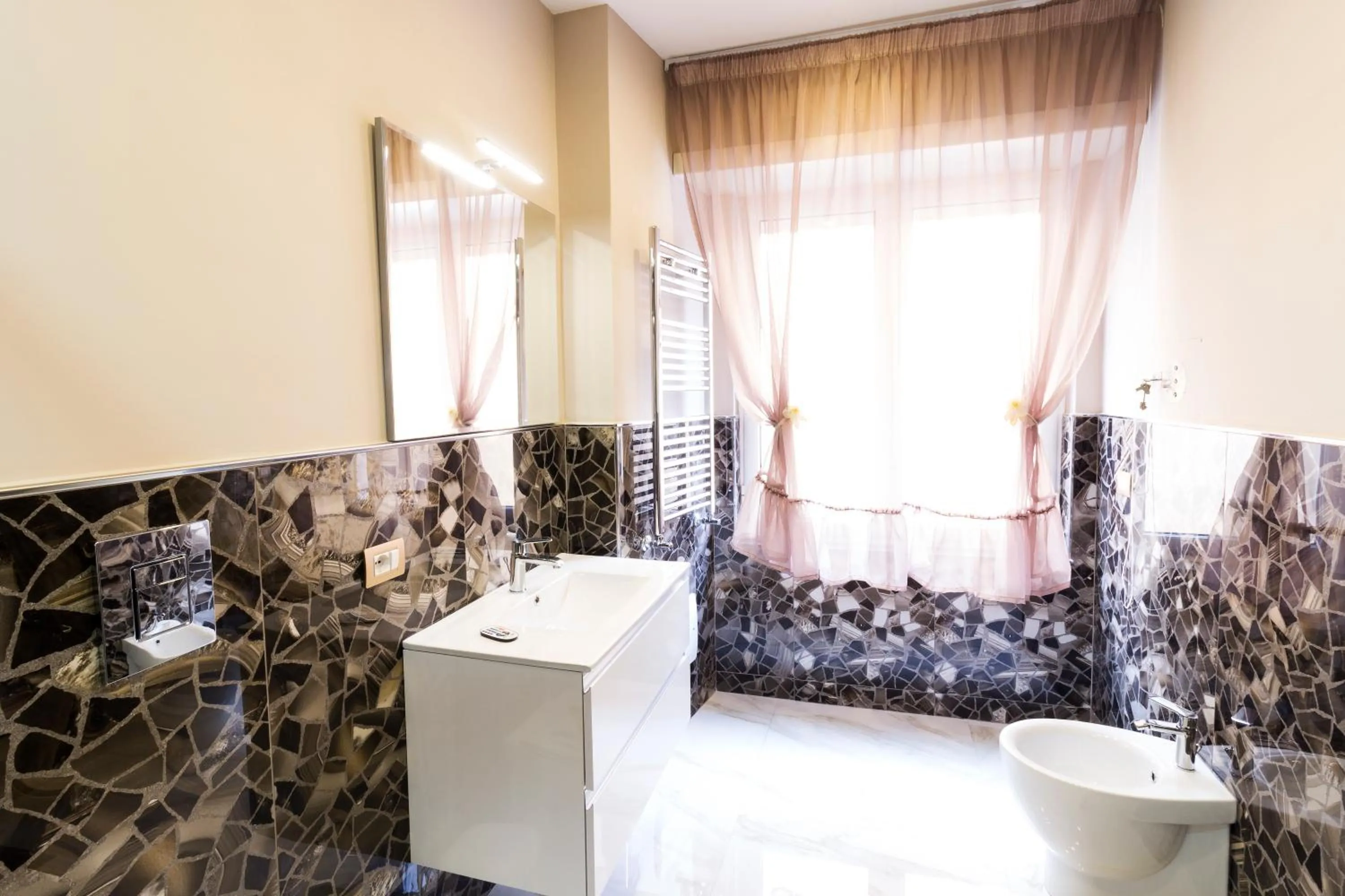 Bathroom in Porto Rooms & Suite