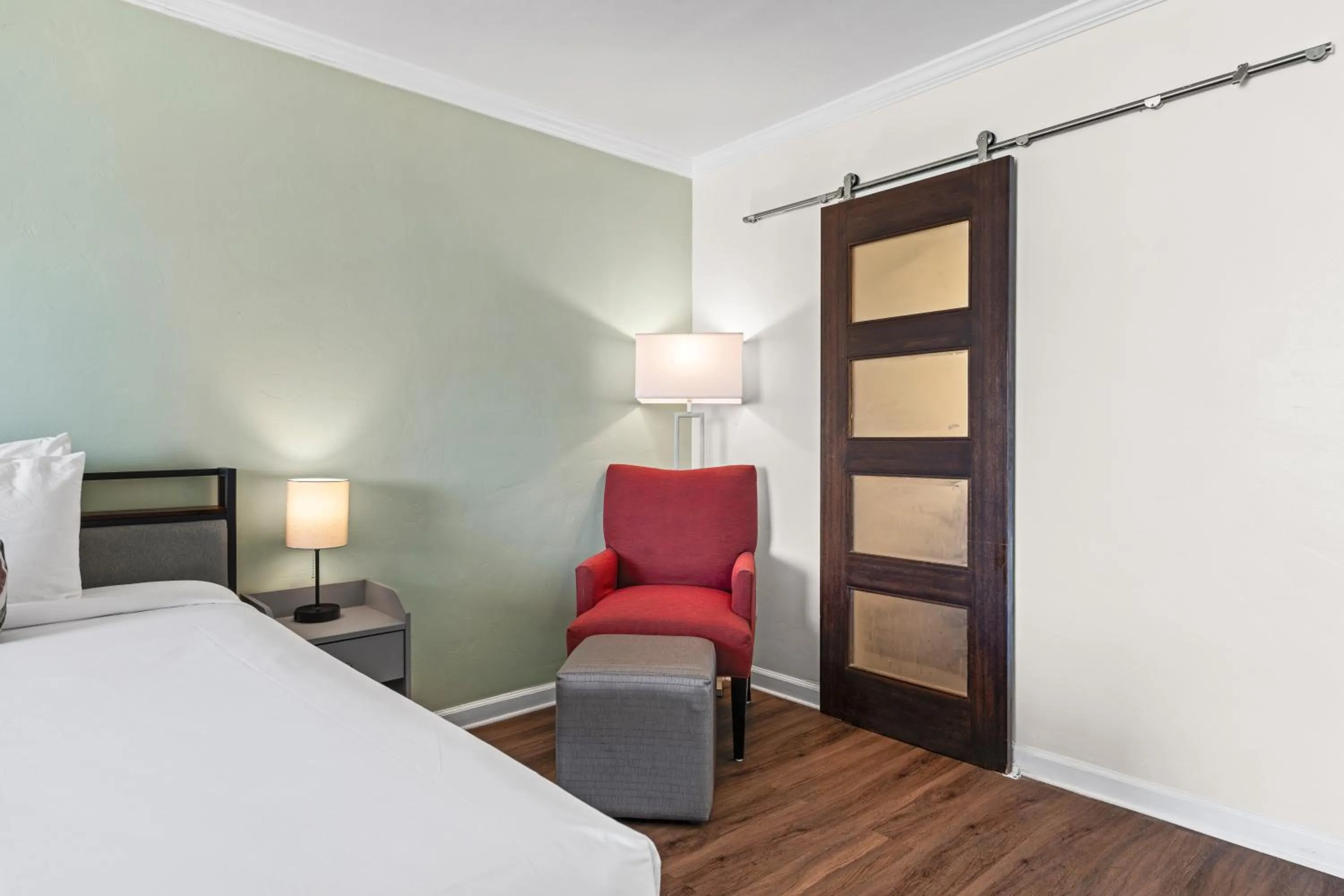 Seating area, Bed in Marina Village Inn