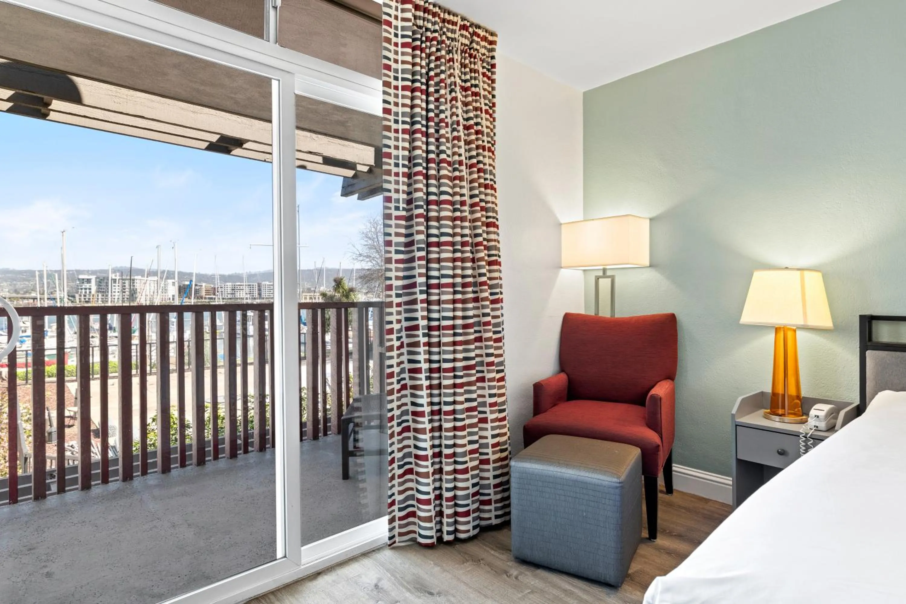 Balcony/Terrace, Bed in Marina Village Inn