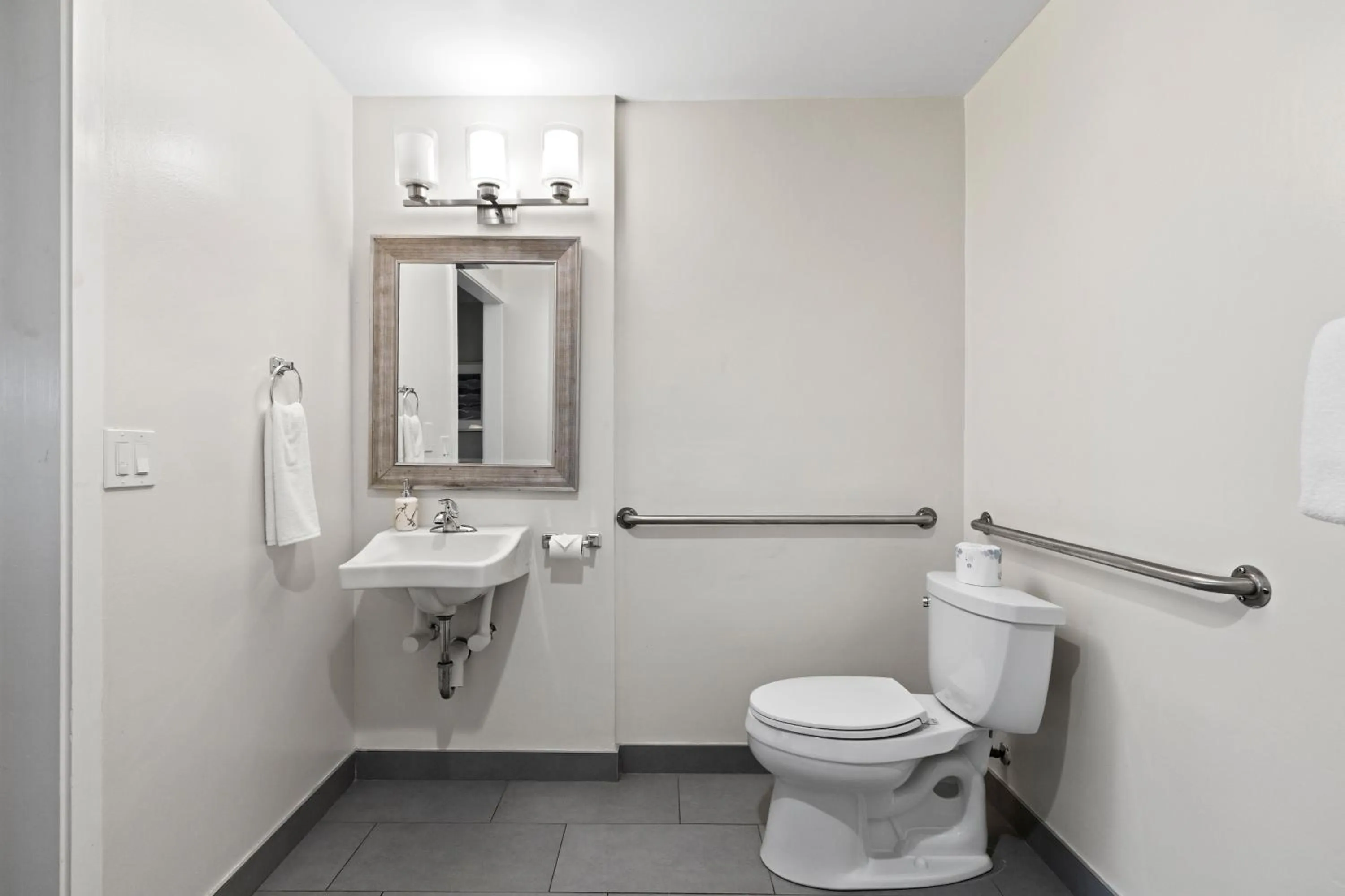 Toilet in Marina Village Inn