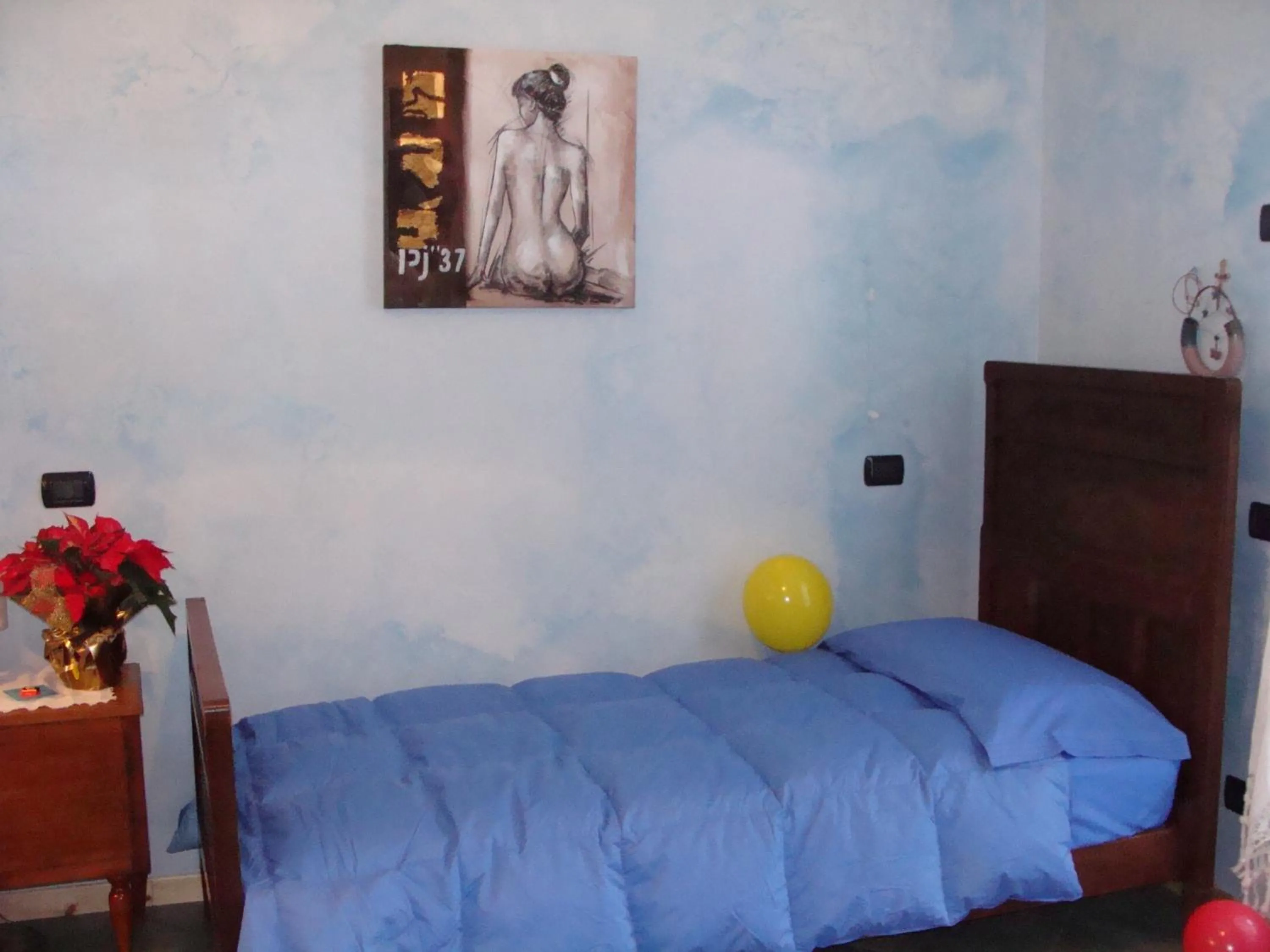 Bed in La Coccinella B&B