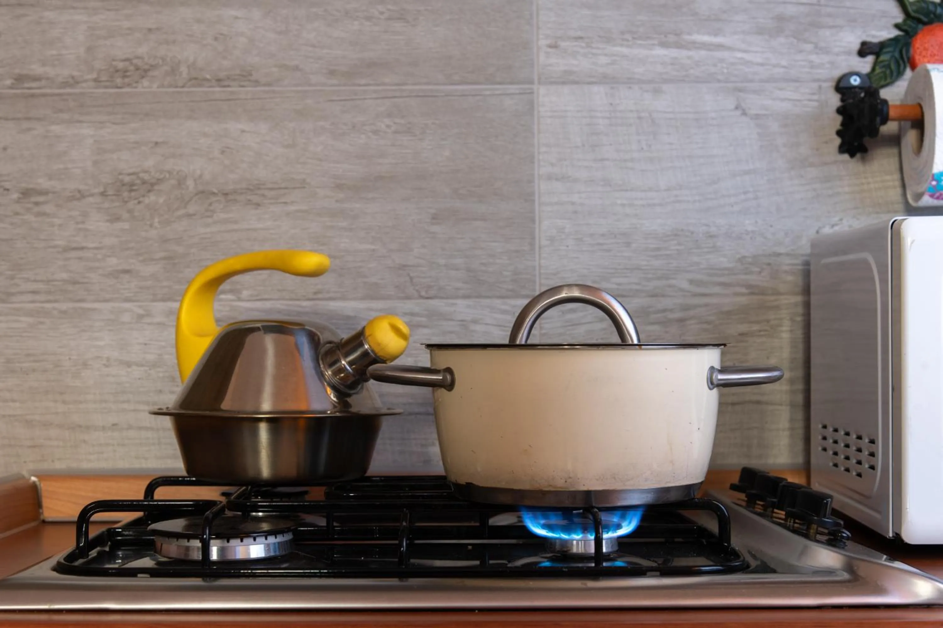 Kitchen or kitchenette in affittacamere S'Ortensia