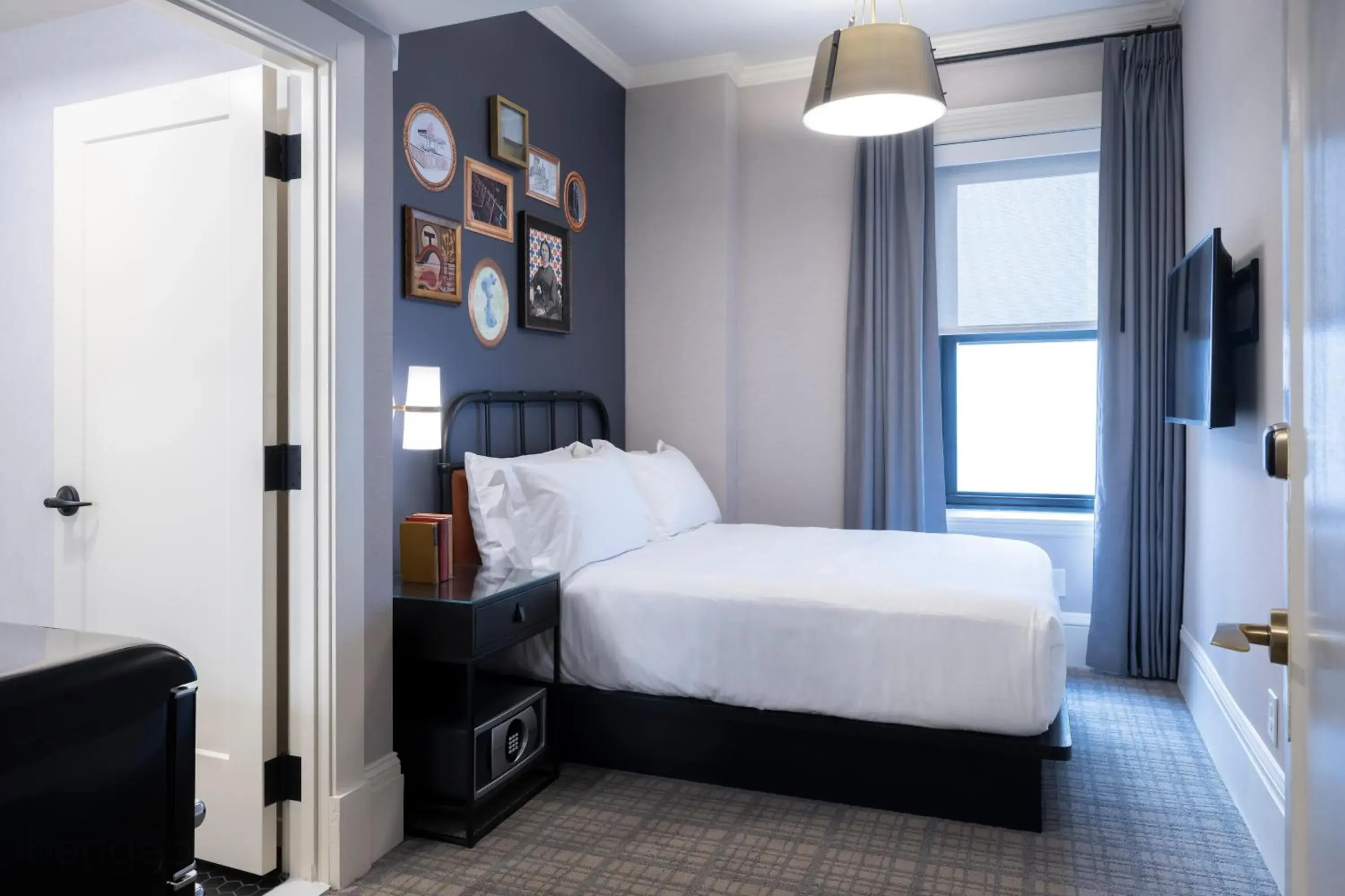 Bed in Copley Square Hotel, a FOUND Hotel Bed in Copley Square Hotel, a FOUND Hotel