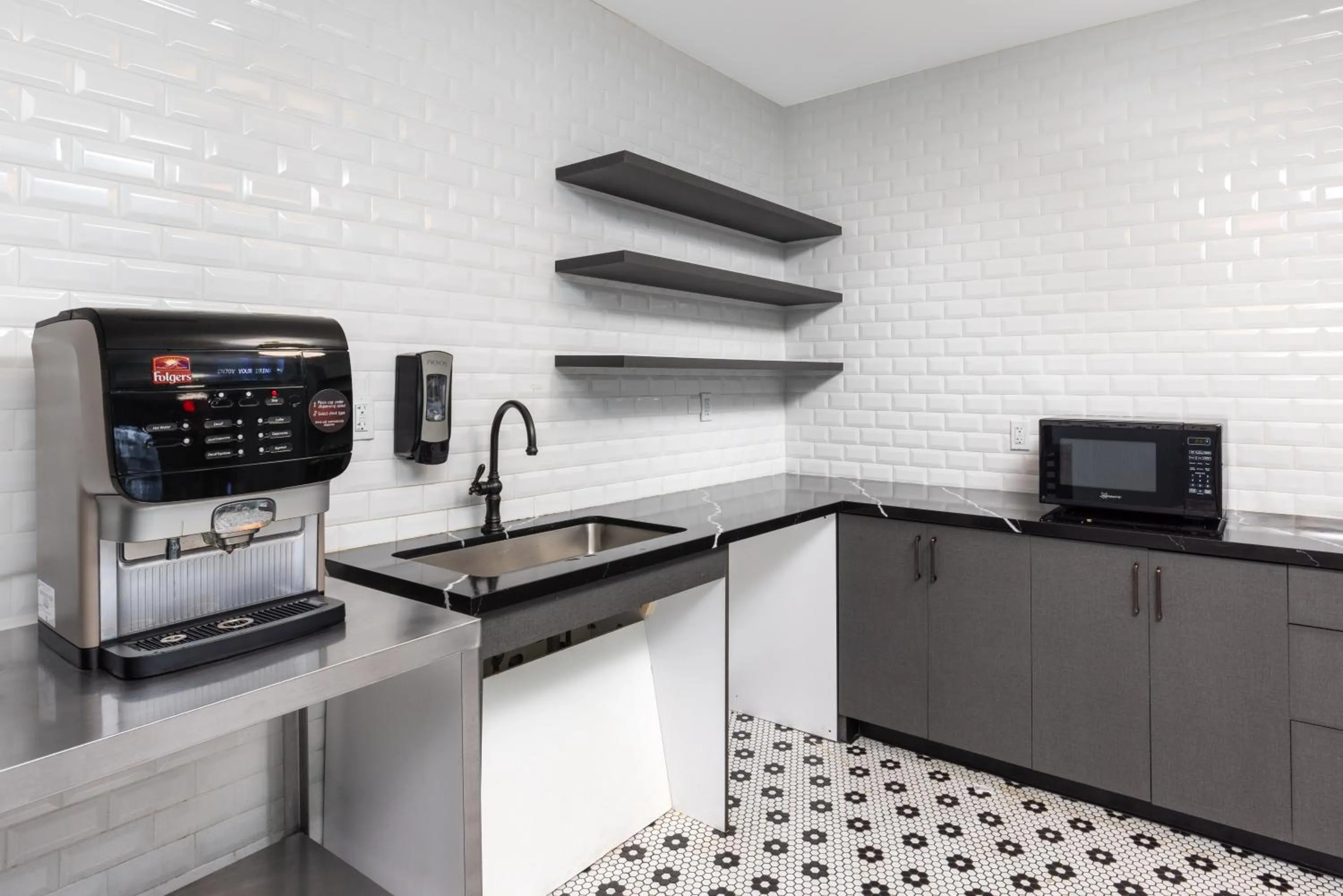 Communal kitchen in Copley Square Hotel, a FOUND Hotel