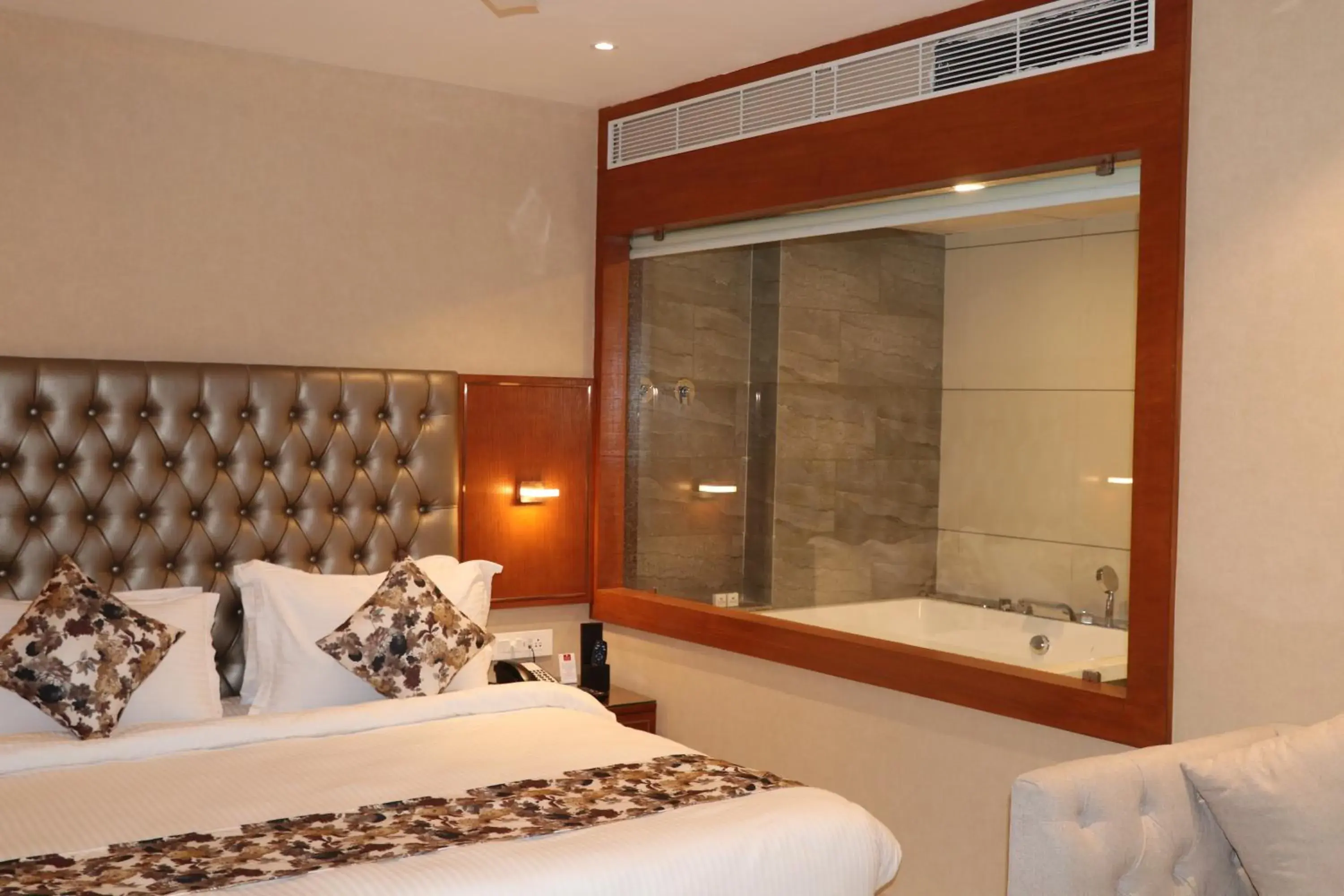 Bedroom, Bed in SK Lords Inn Ahmedabad Bedroom, Bed in SK Lords Inn Ahmedabad