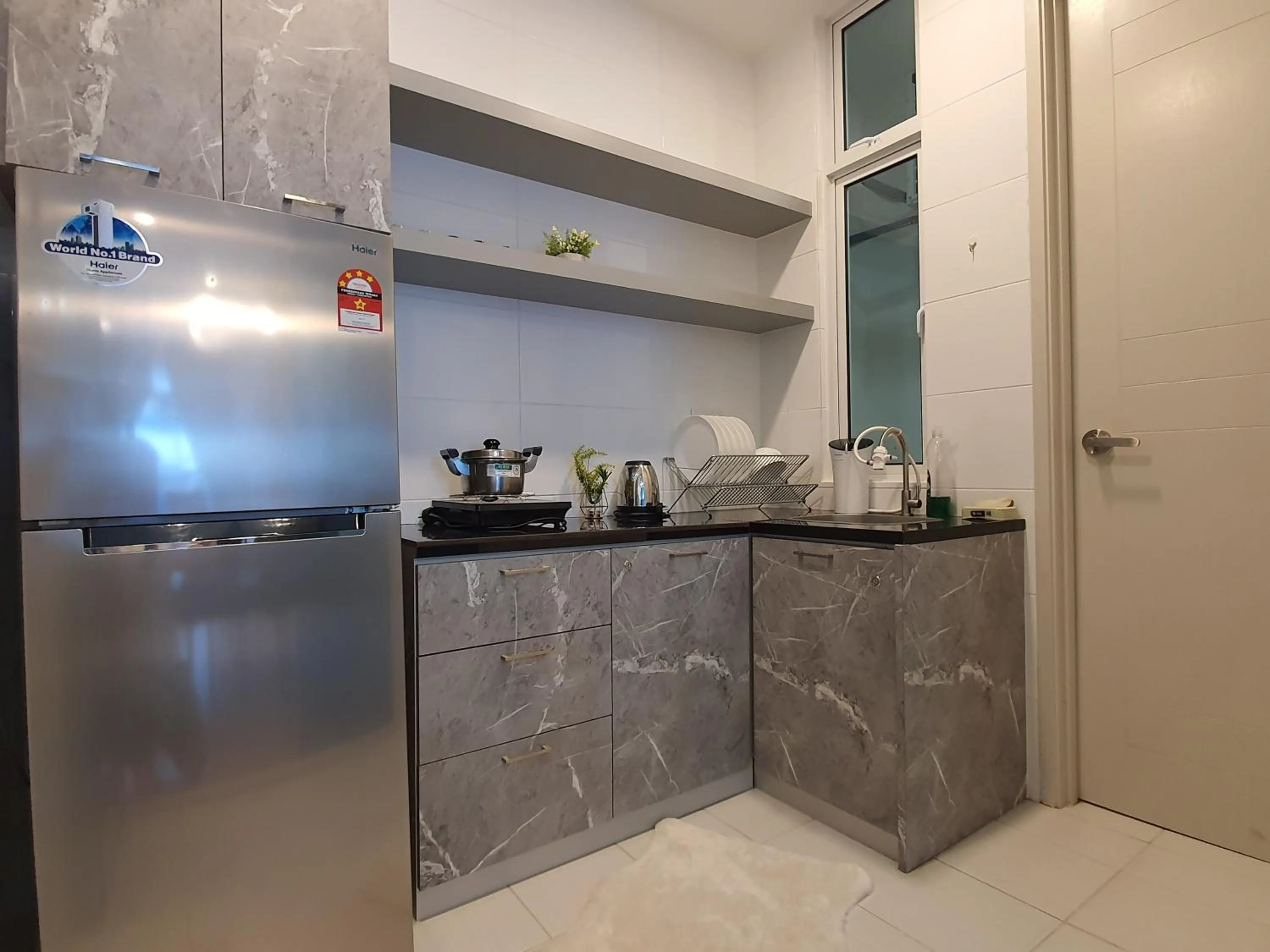 Kitchen or kitchenette in The Wave Suites Melaka