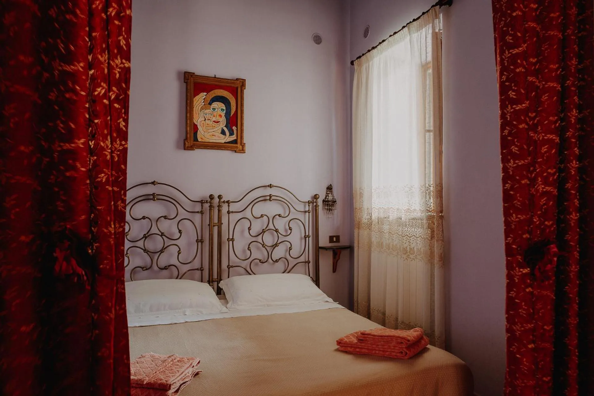 Bed in La Baronessa B&B