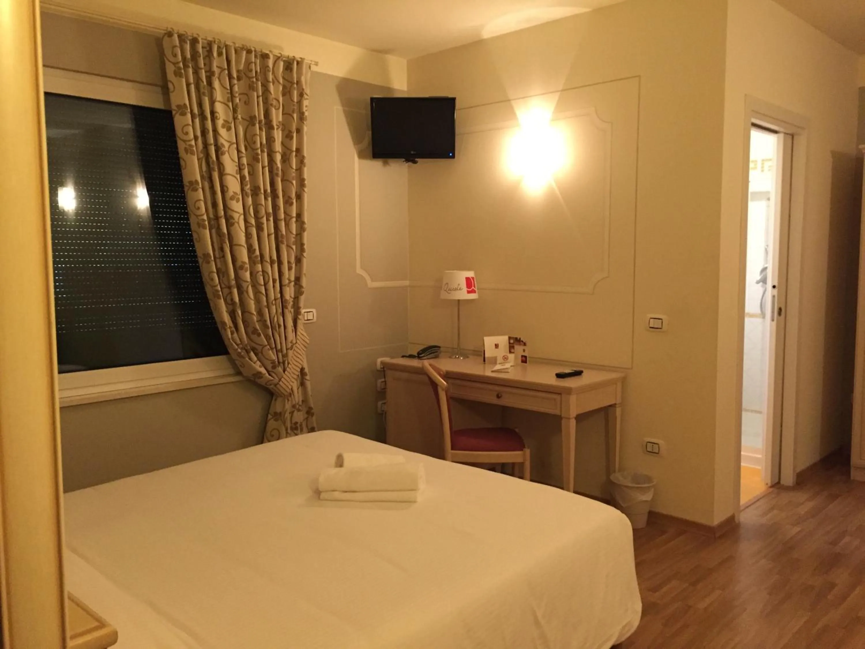 Photo of the whole room, Bed in Albergo La Quiete