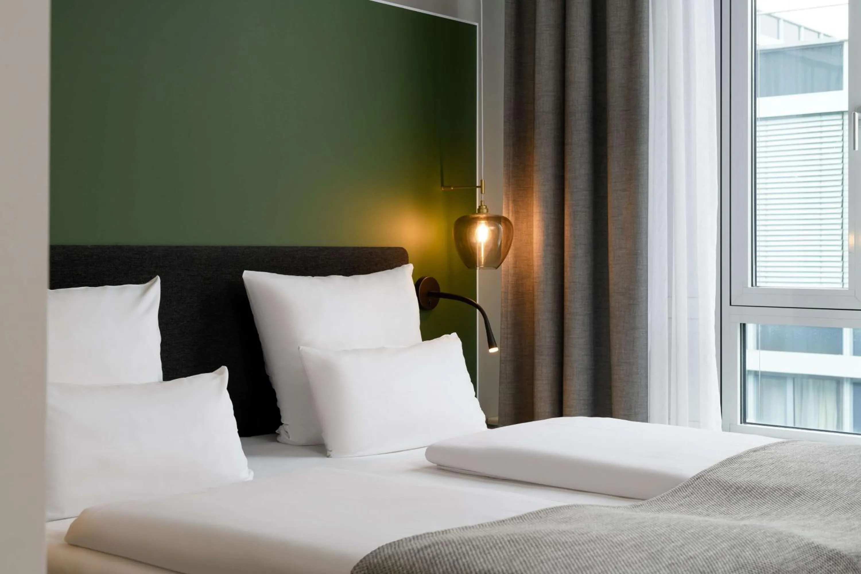 Bedroom, Bed in Flightgate Munich Airport Hotel, a member of Radisson Individuals