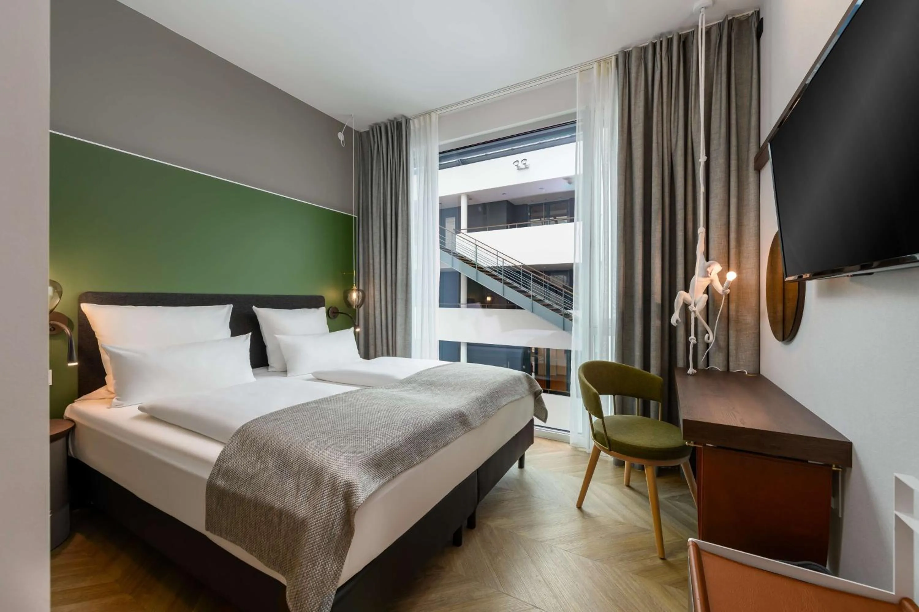 Bedroom, Bed in Flightgate Munich Airport Hotel, a member of Radisson Individuals