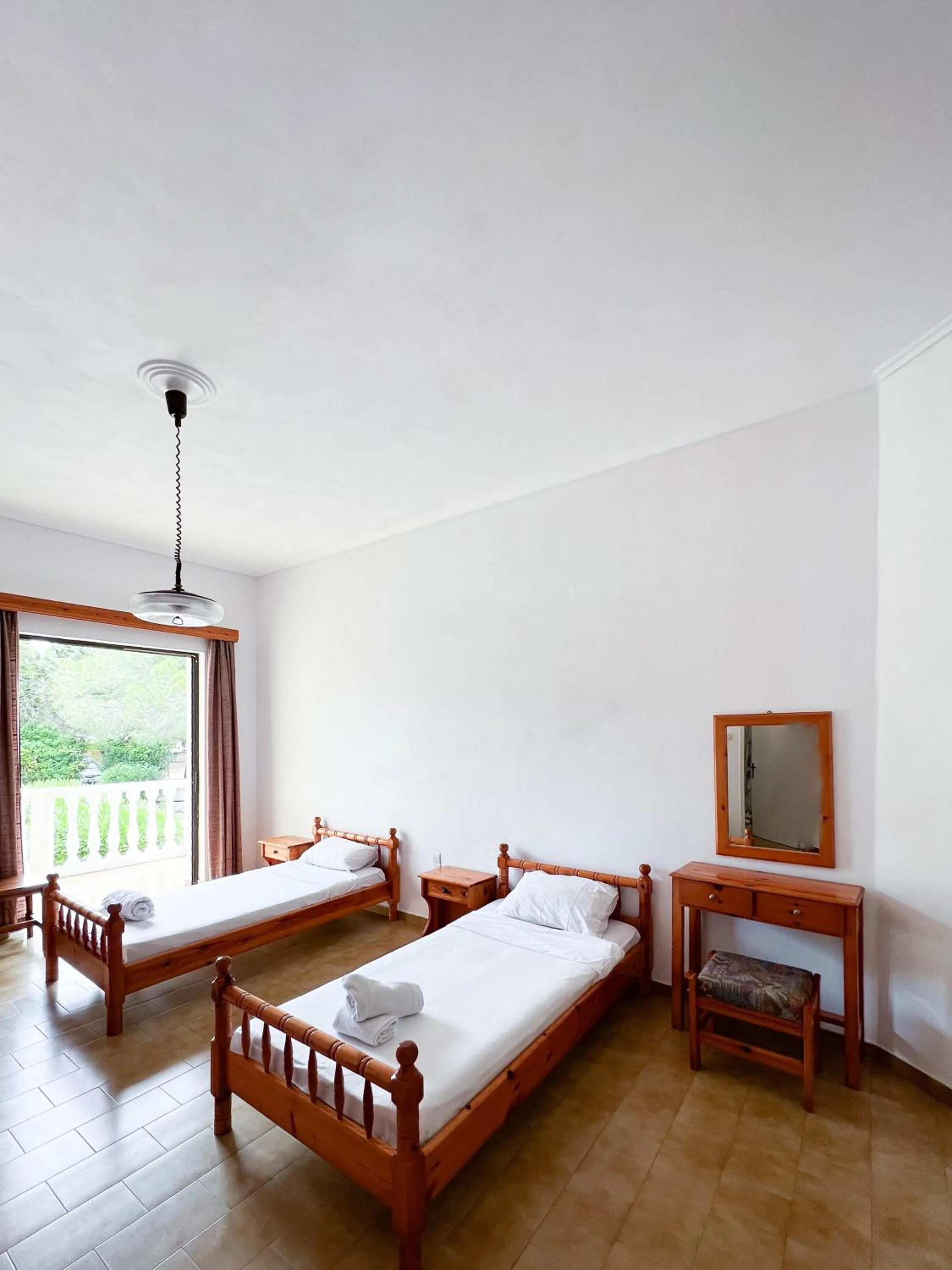 Bed in Stamiris Beach Hotel