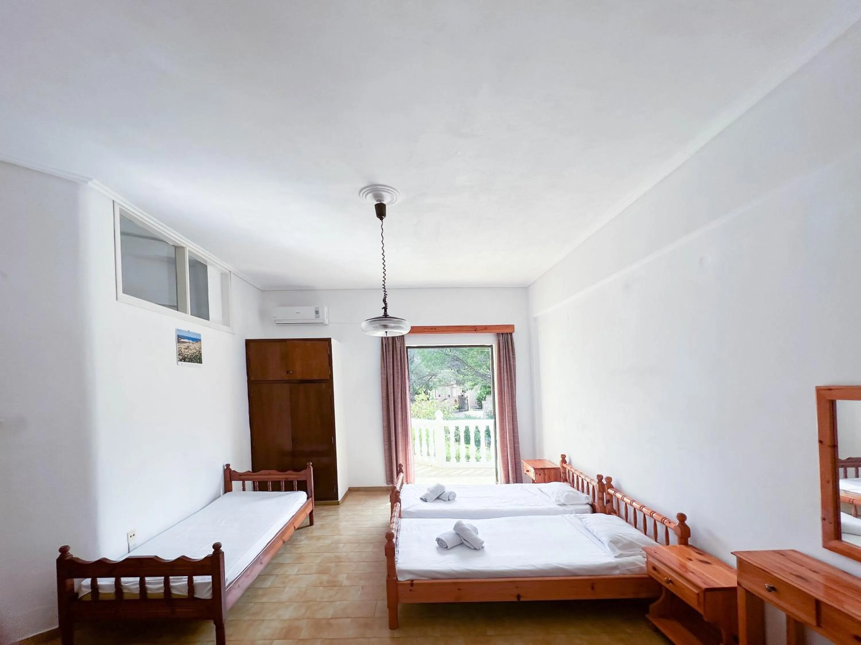 Bed in Stamiris Beach Hotel