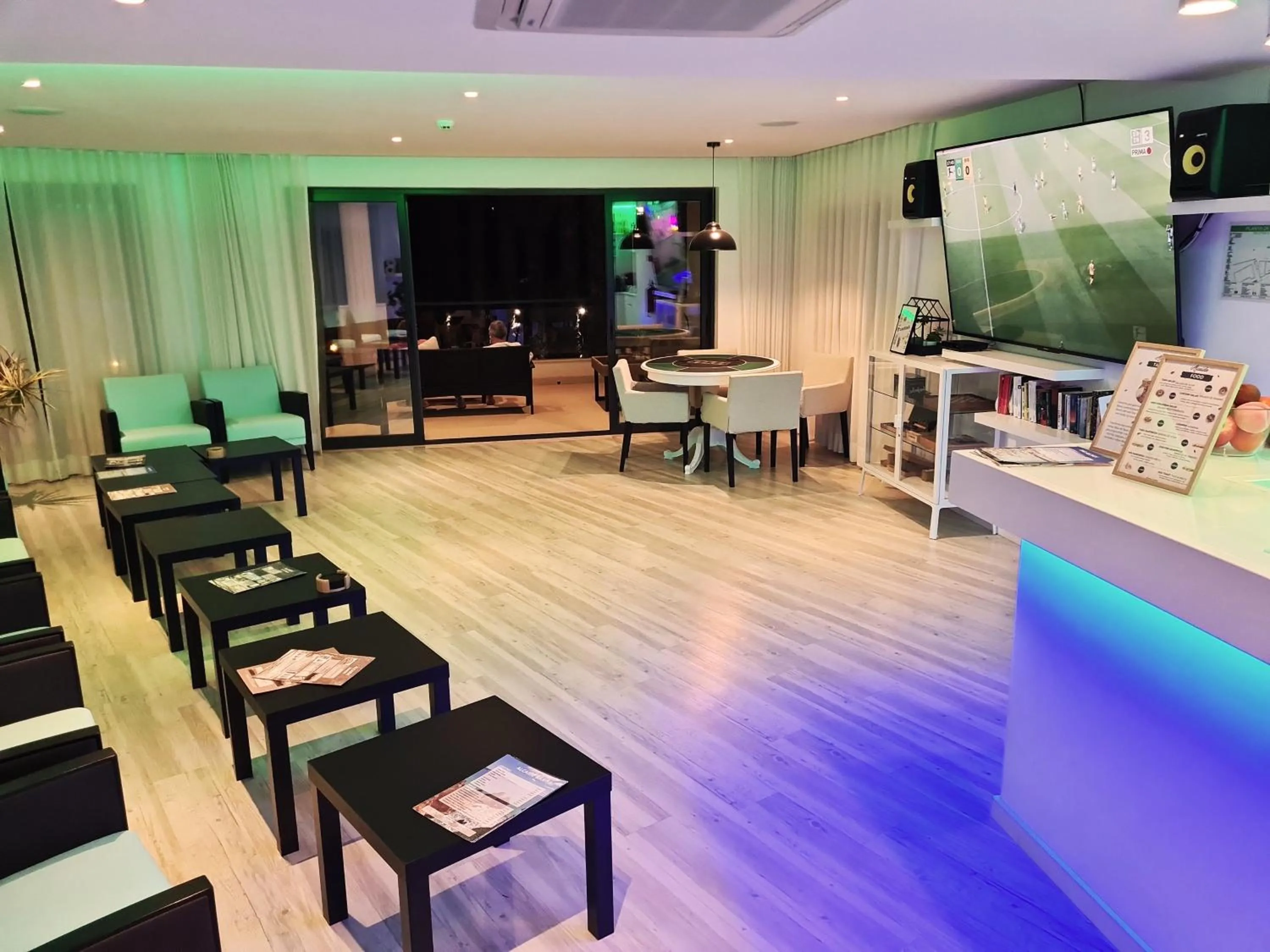 Communal lounge/ TV room in Villa Alcaide