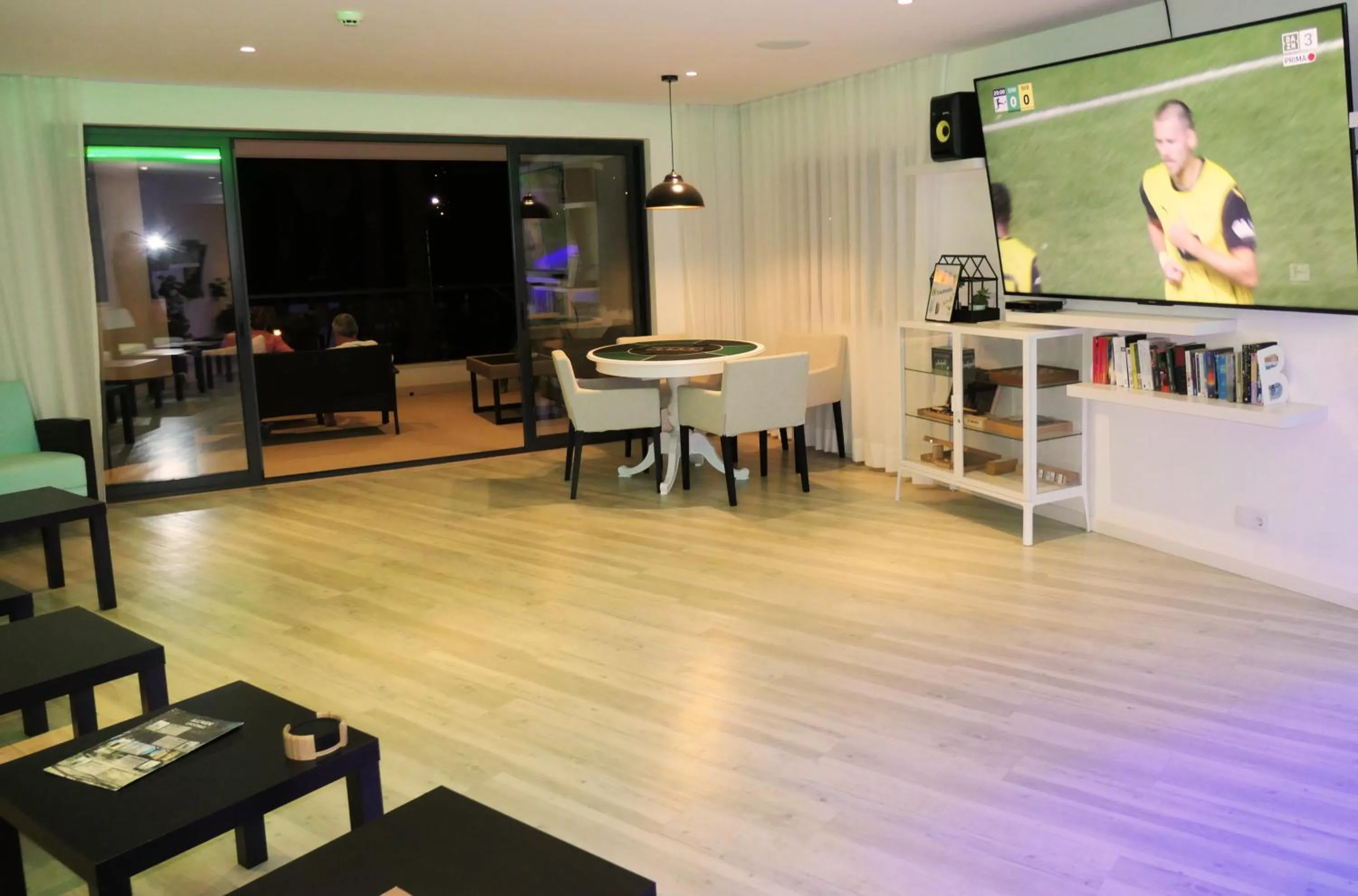 Communal lounge/ TV room in Villa Alcaide