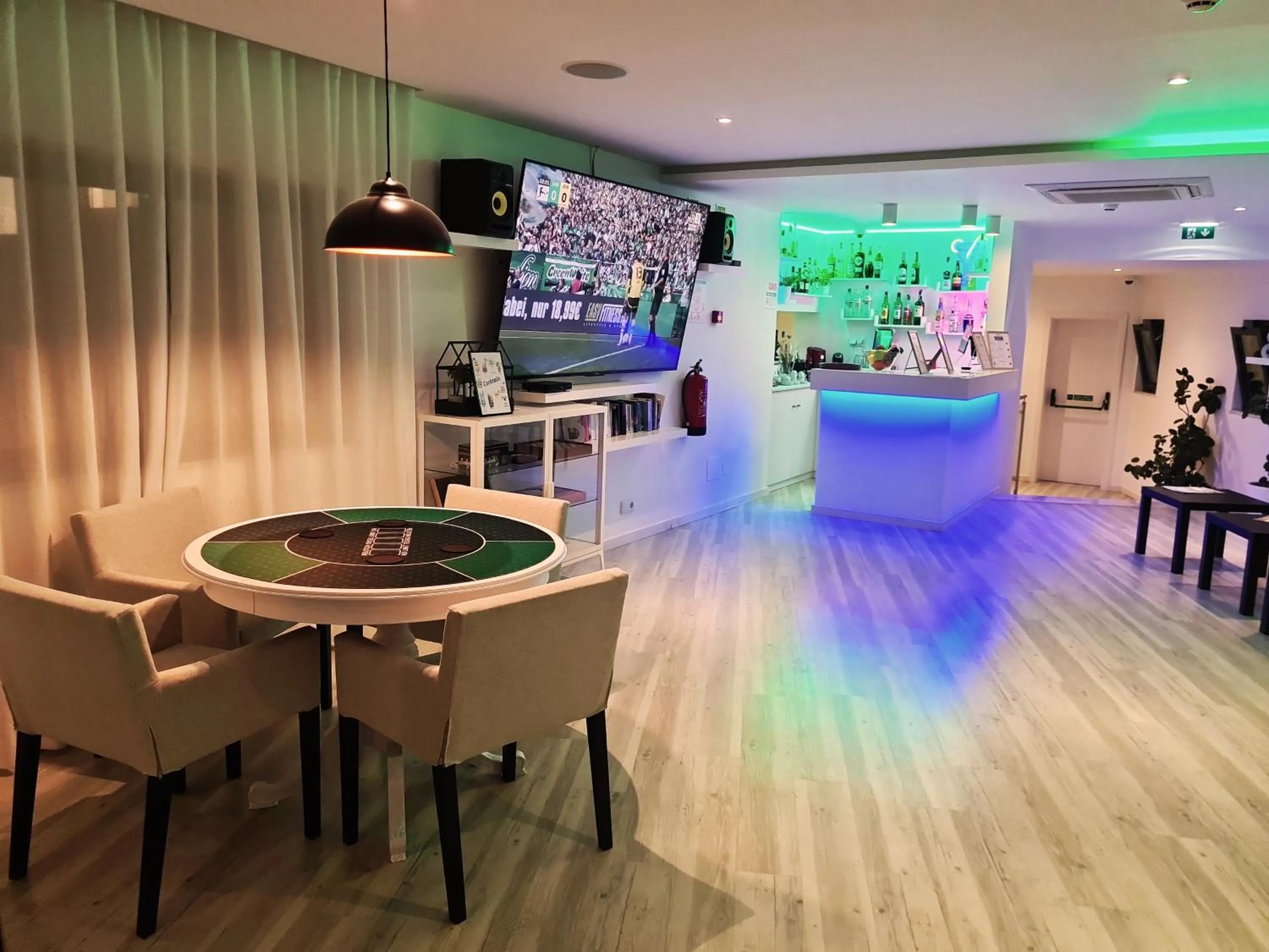 Communal lounge/ TV room in Villa Alcaide