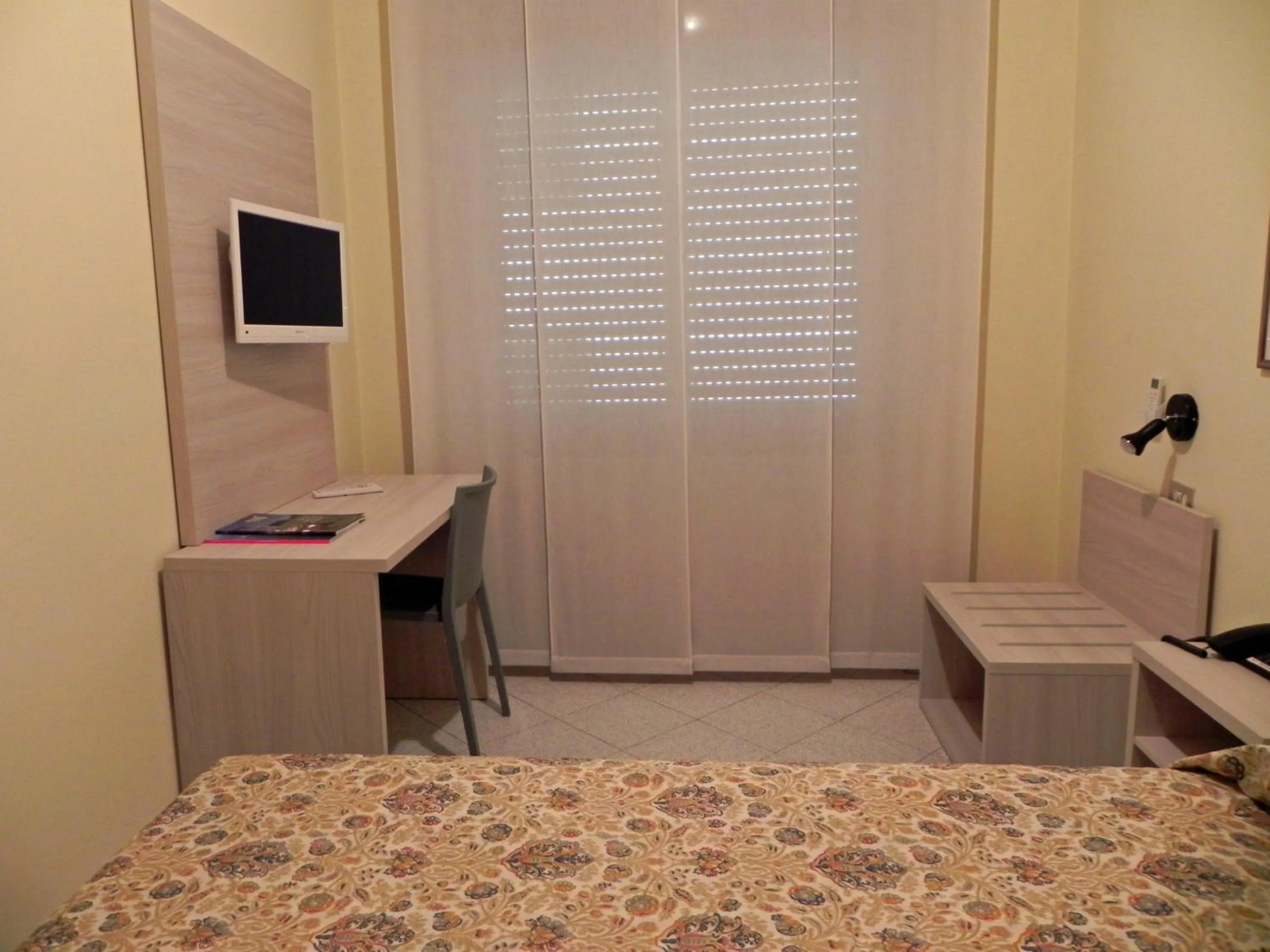 Bed in Albergo Sant'Anna