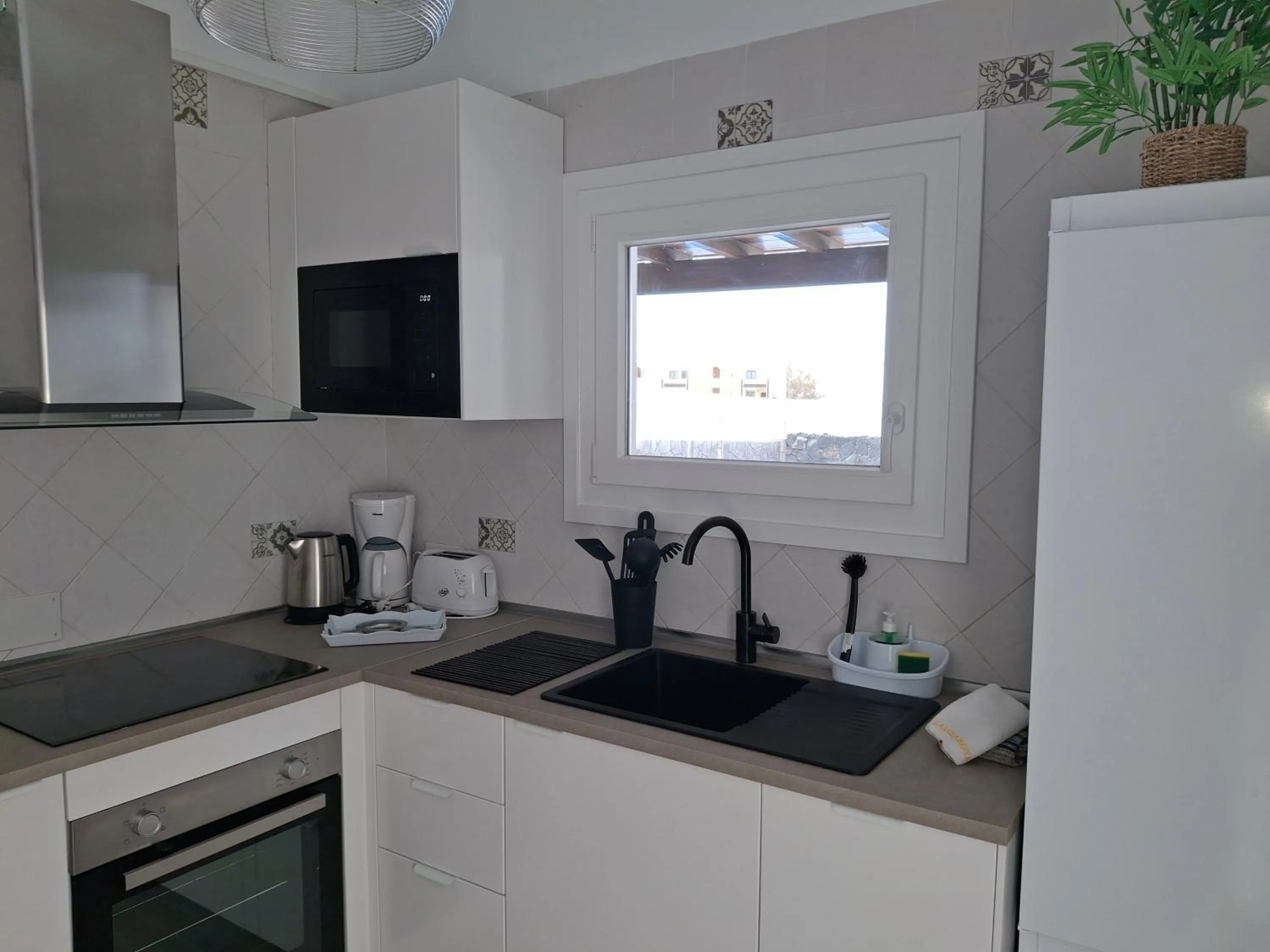 Kitchen or kitchenette in Villa Mariola