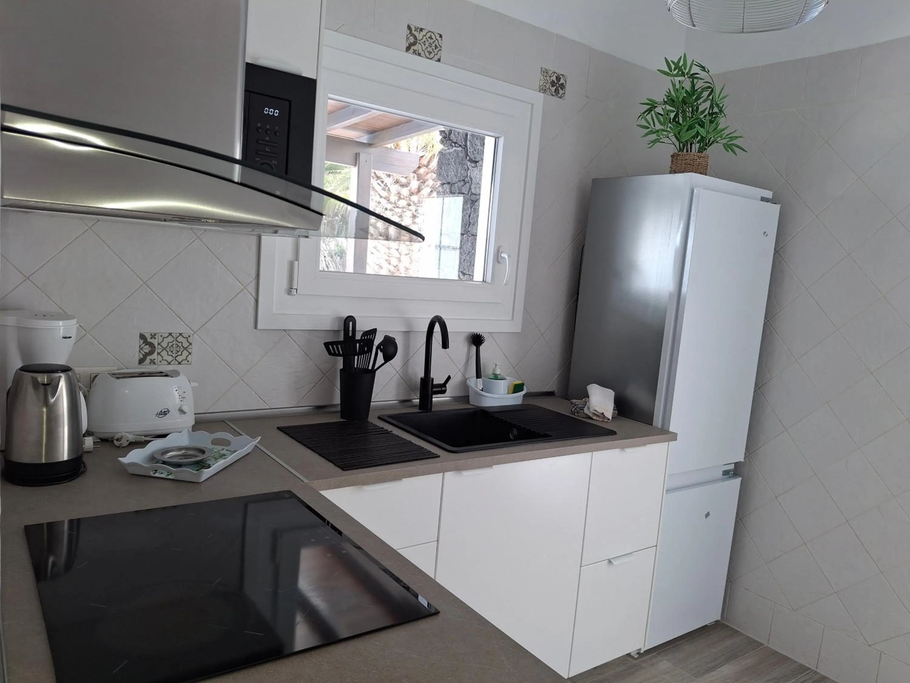 Kitchen or kitchenette in Villa Mariola
