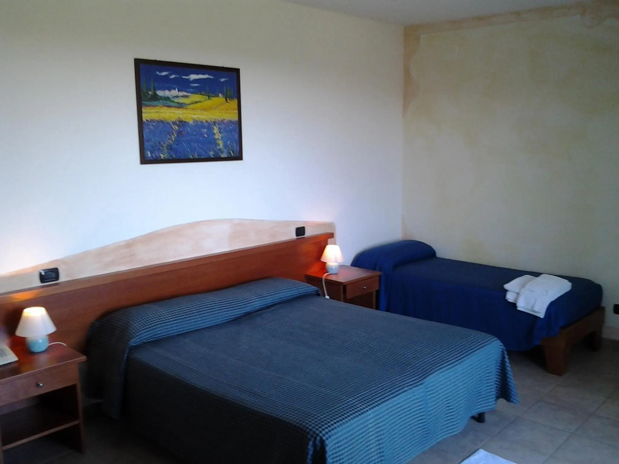 Bed in Hotel Il Melograno