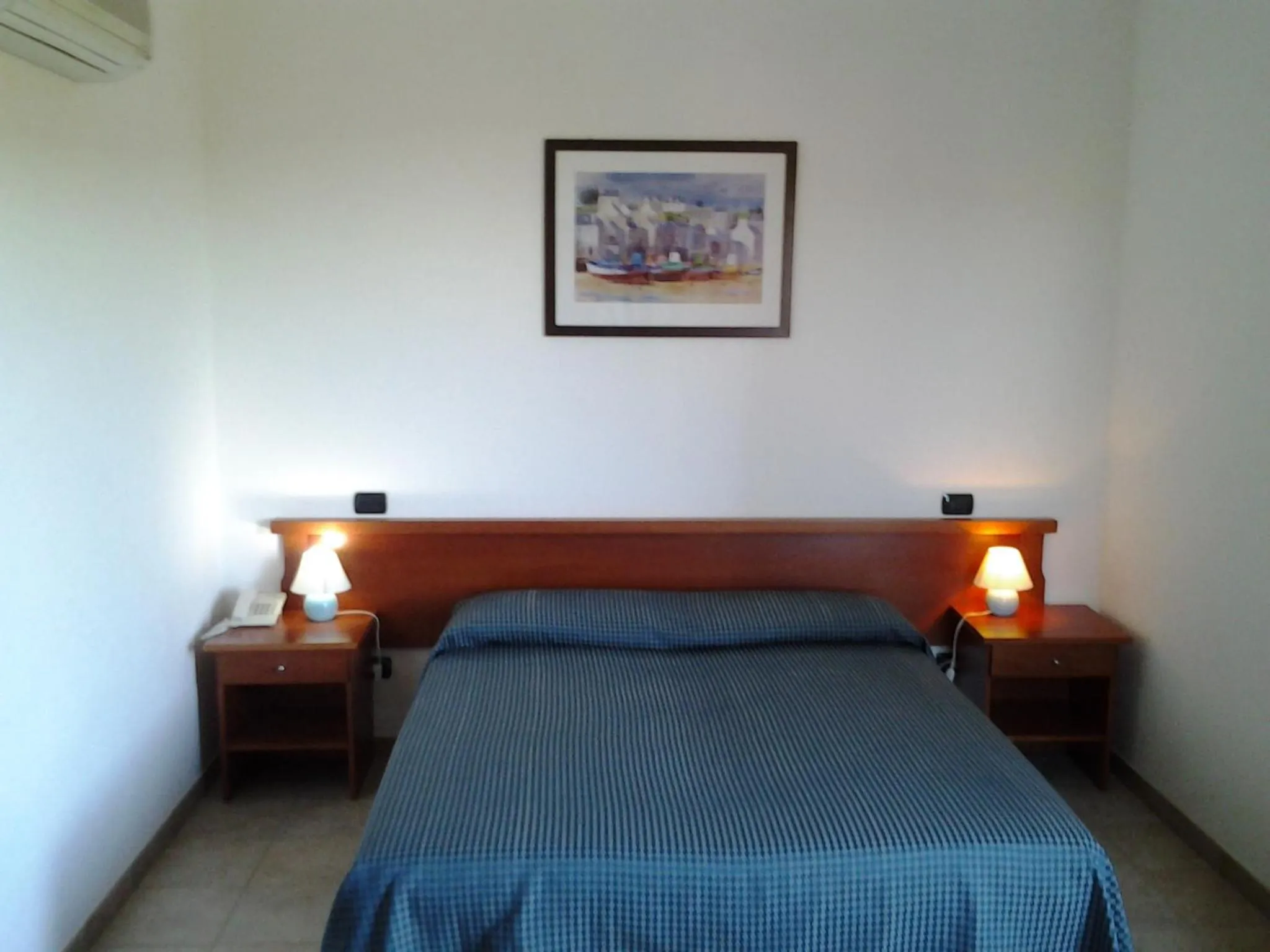 Bed in Hotel Il Melograno