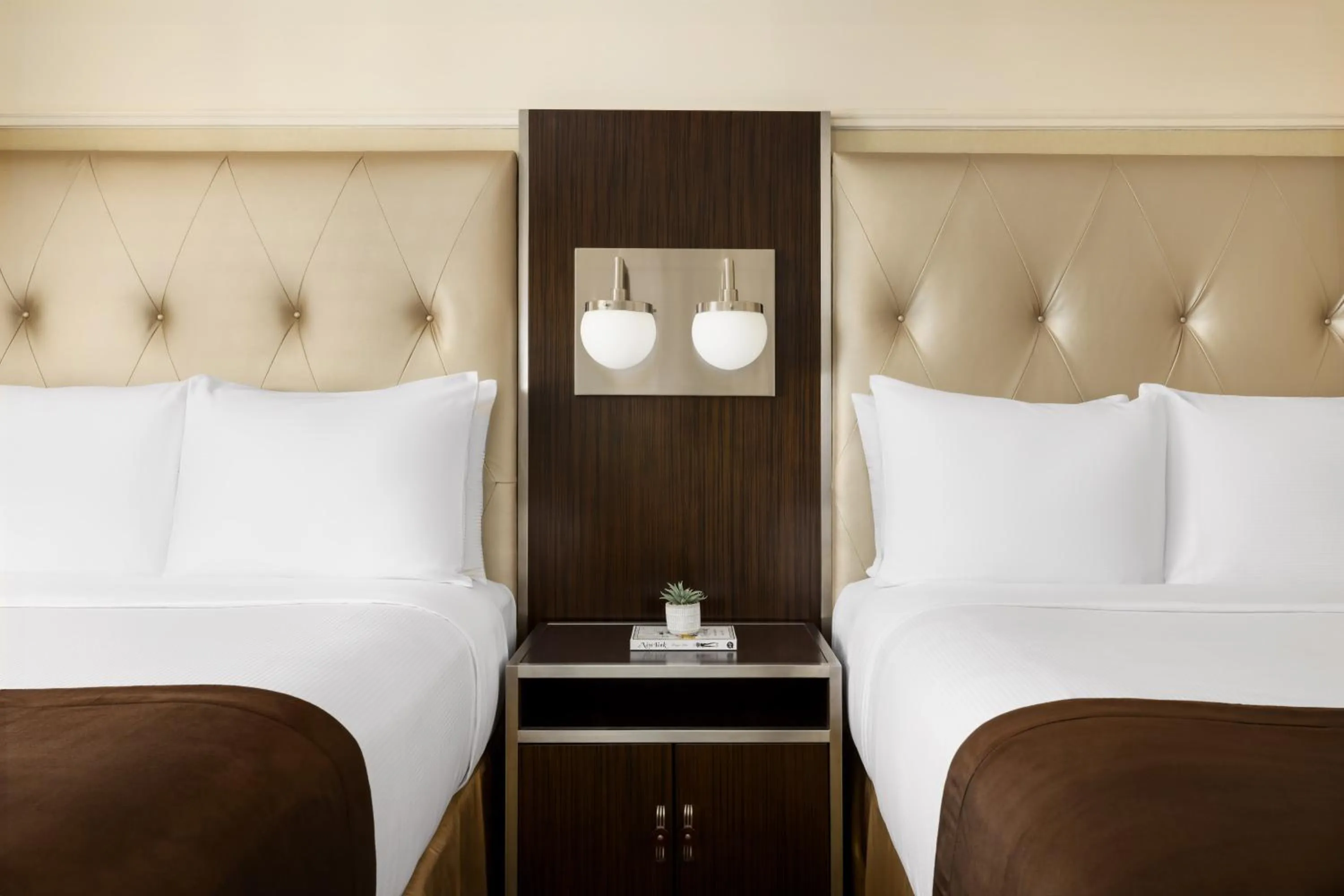 Bed in New Yorker by Lotte Hotels