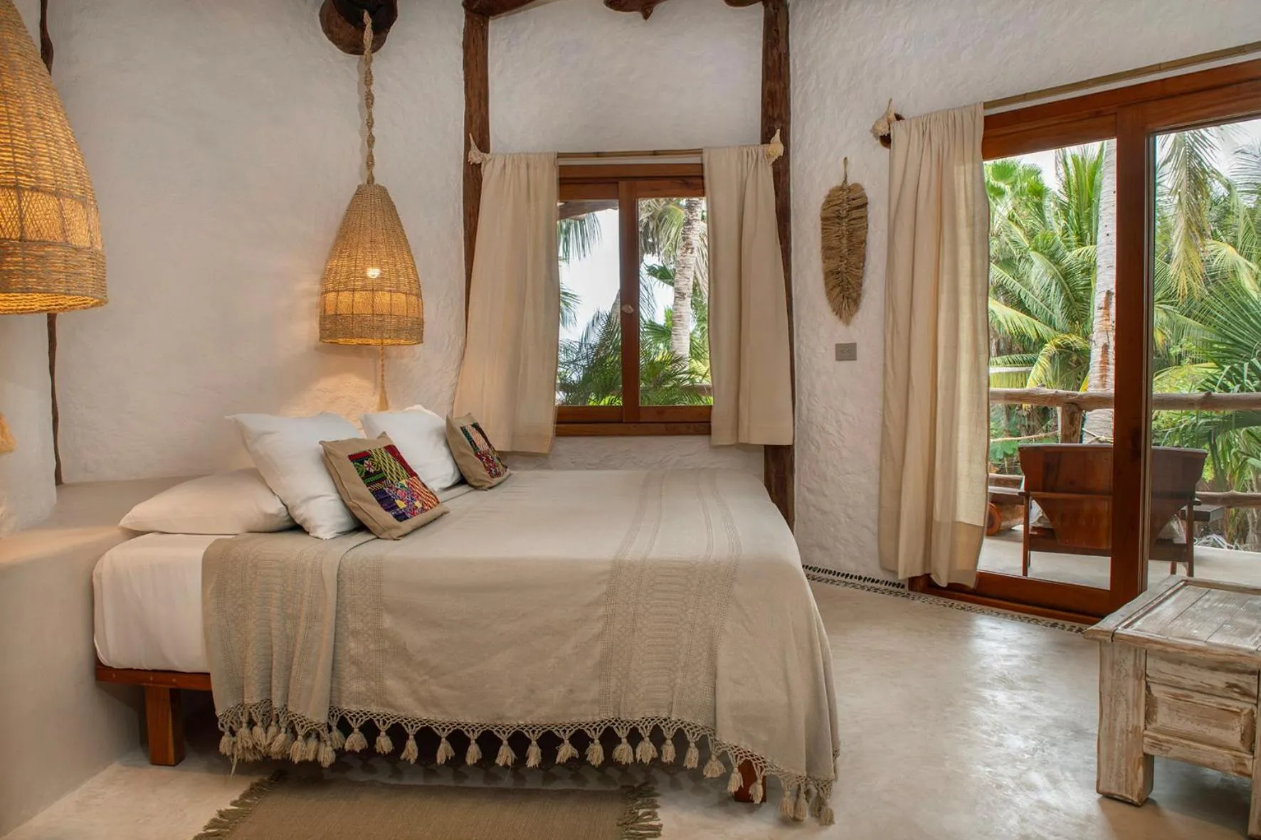 Bed in Mawimbi Boutique Hotel