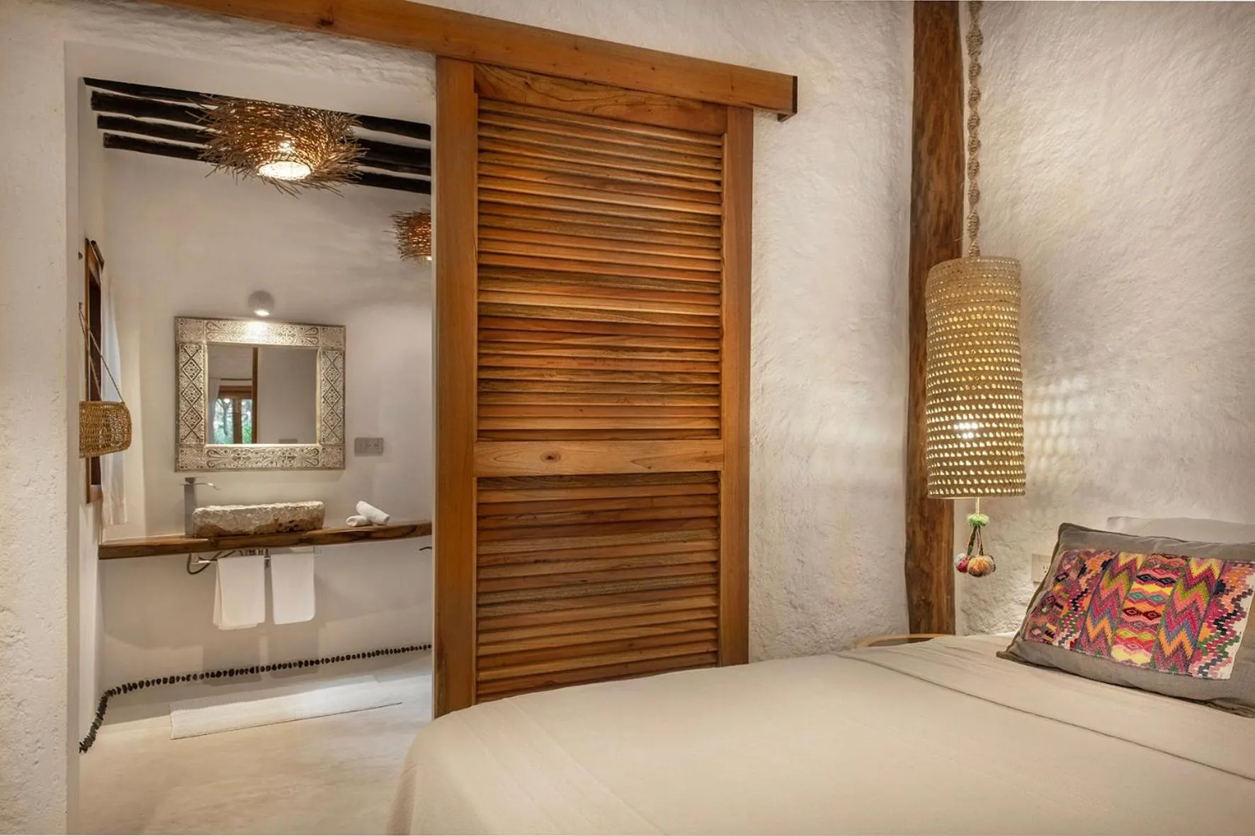 Bed in Mawimbi Boutique Hotel