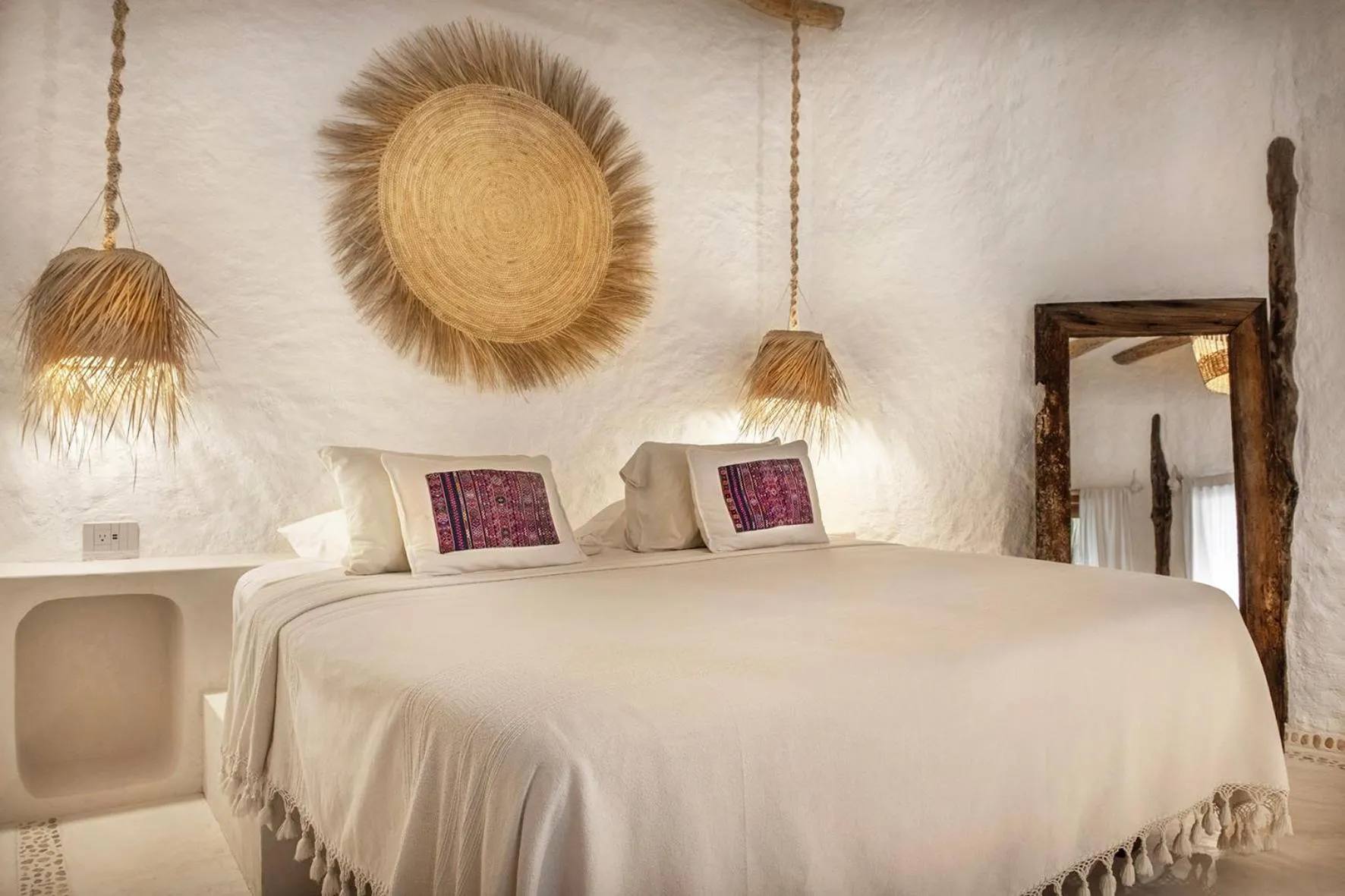Bed in Mawimbi Boutique Hotel