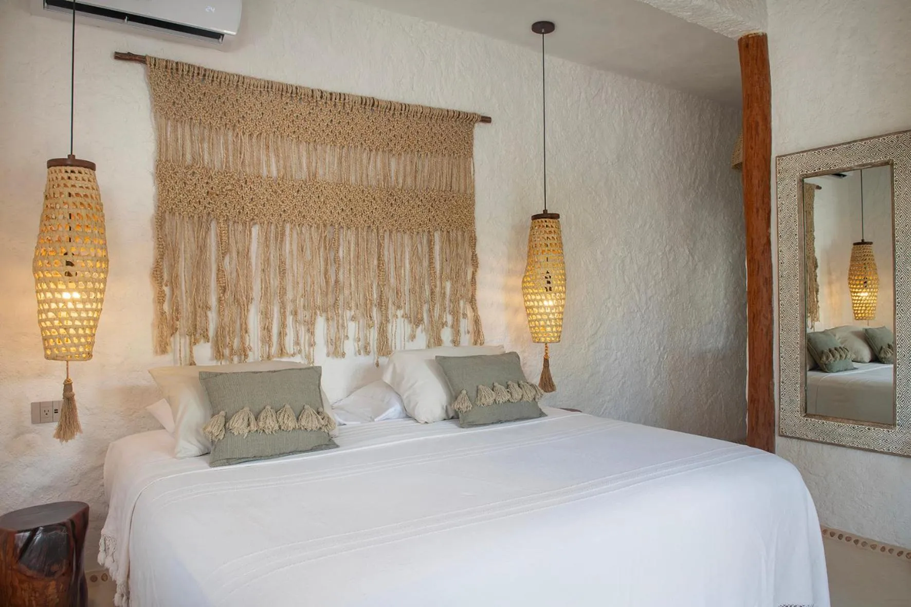 Bed in Mawimbi Boutique Hotel