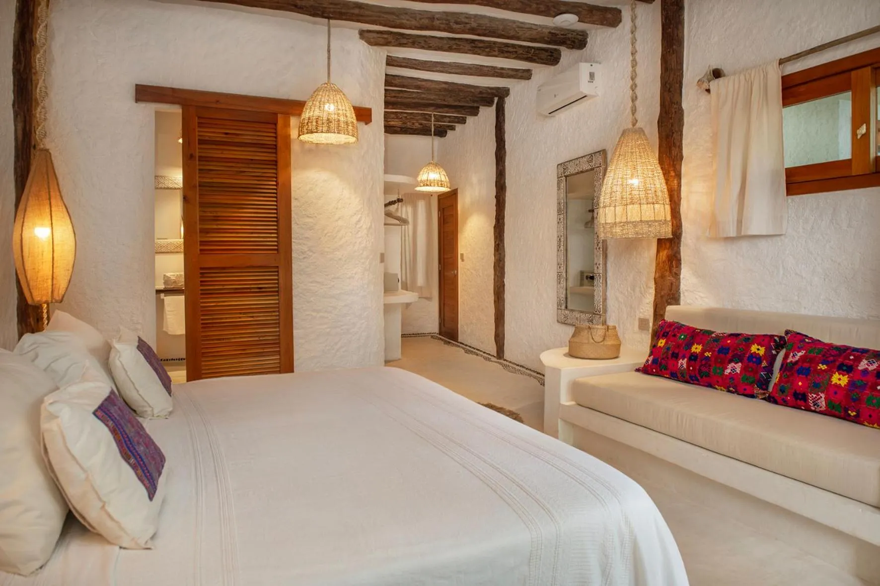 Bed in Mawimbi Boutique Hotel