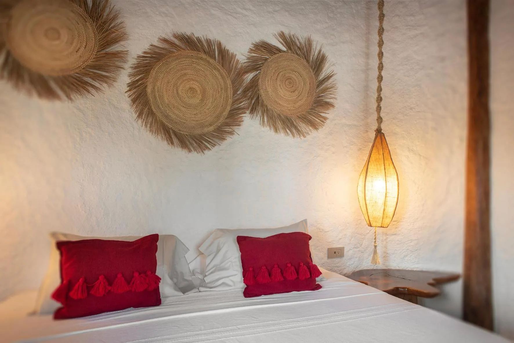 Bed in Mawimbi Boutique Hotel