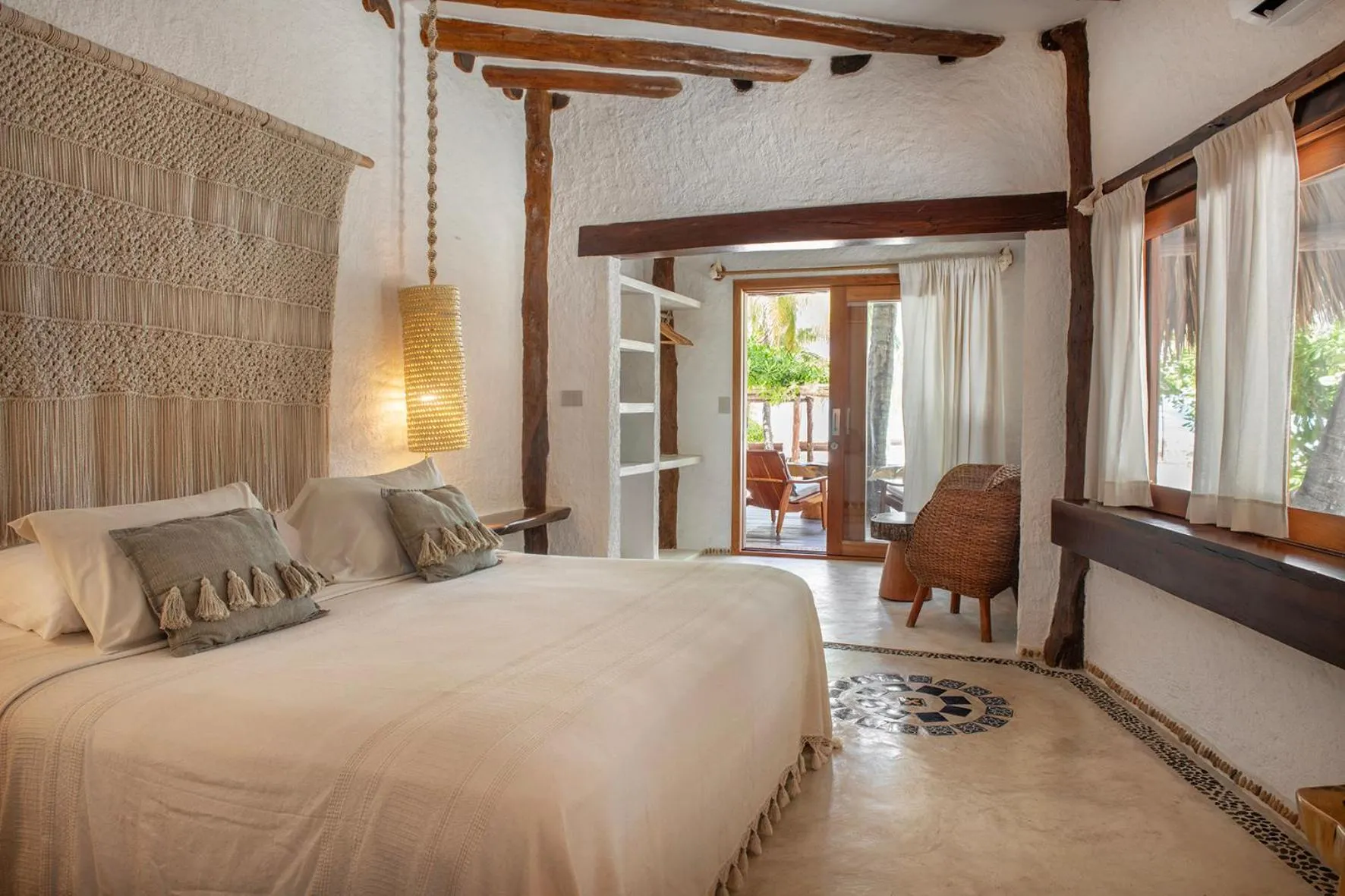 Bed in Mawimbi Boutique Hotel