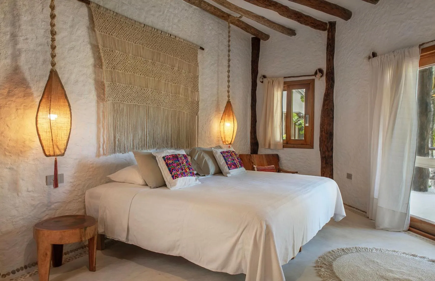 Bed in Mawimbi Boutique Hotel