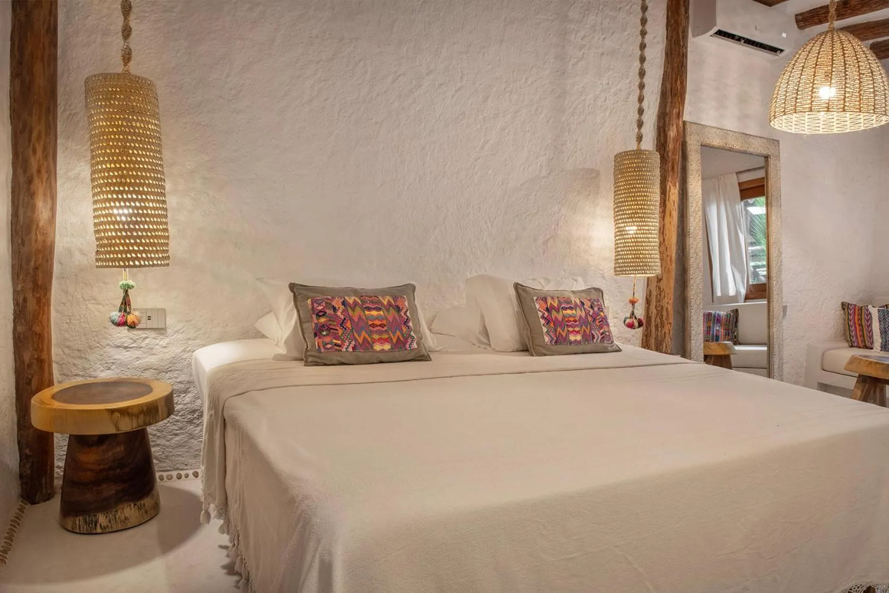 Bed in Mawimbi Boutique Hotel