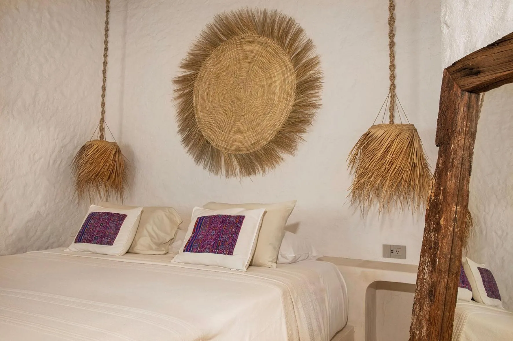 Bed in Mawimbi Boutique Hotel