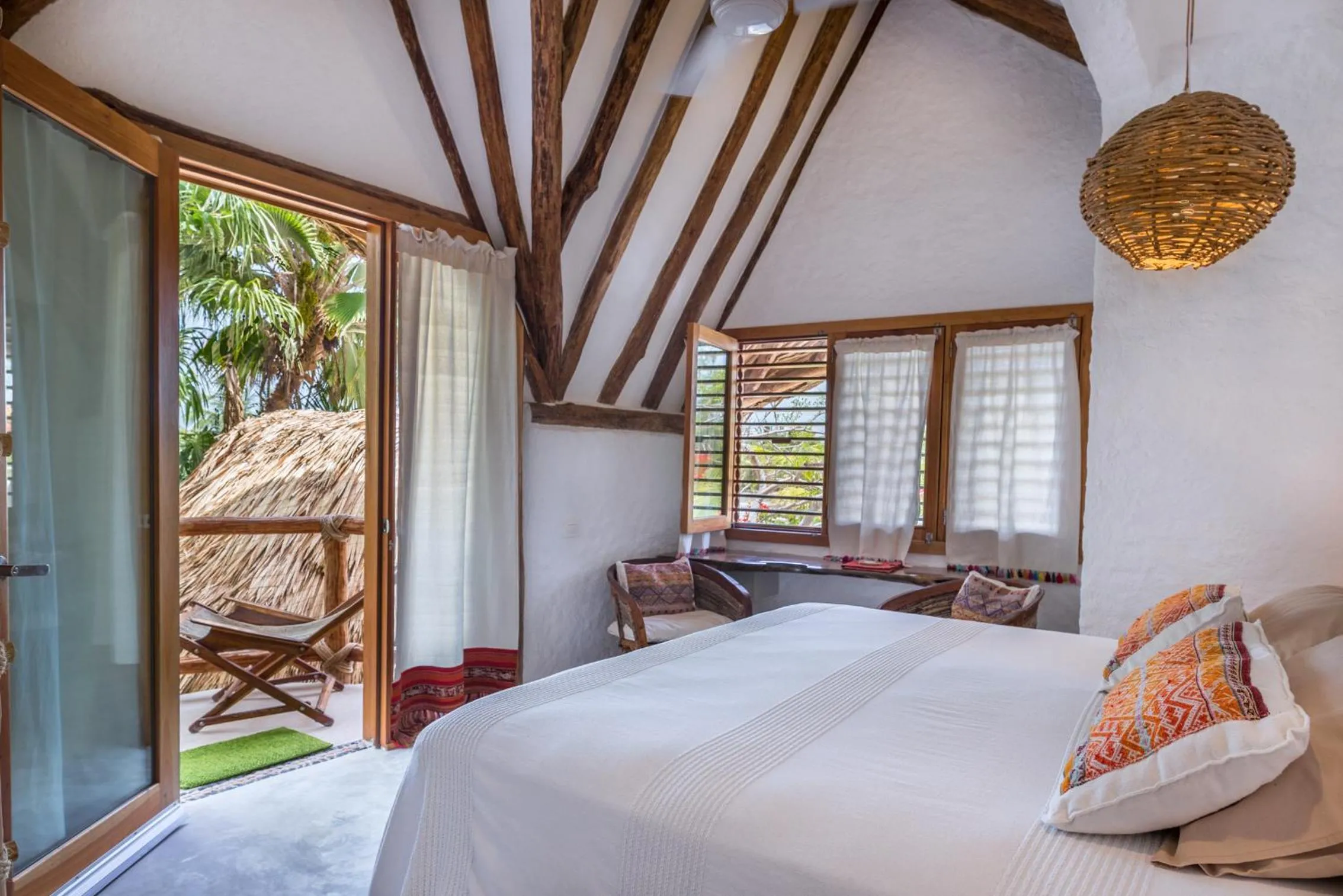 Bed in Mawimbi Boutique Hotel