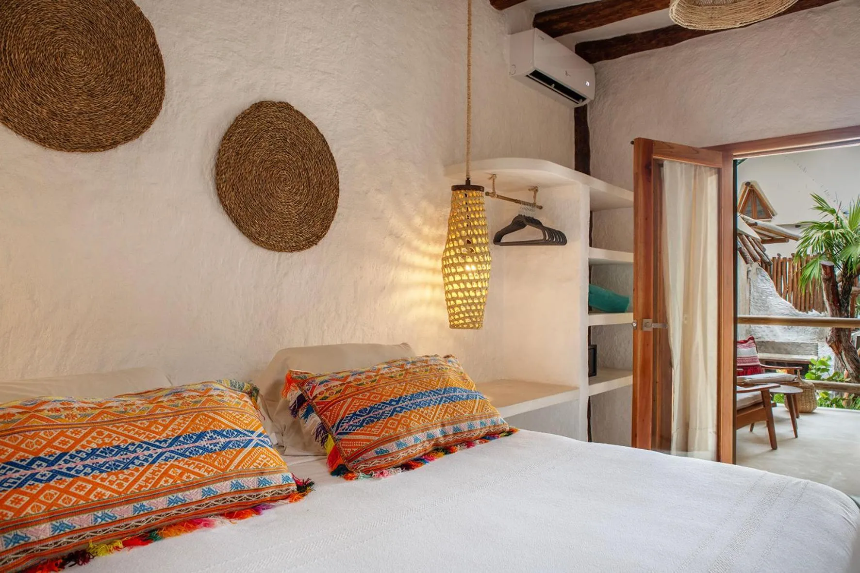 Bed in Mawimbi Boutique Hotel