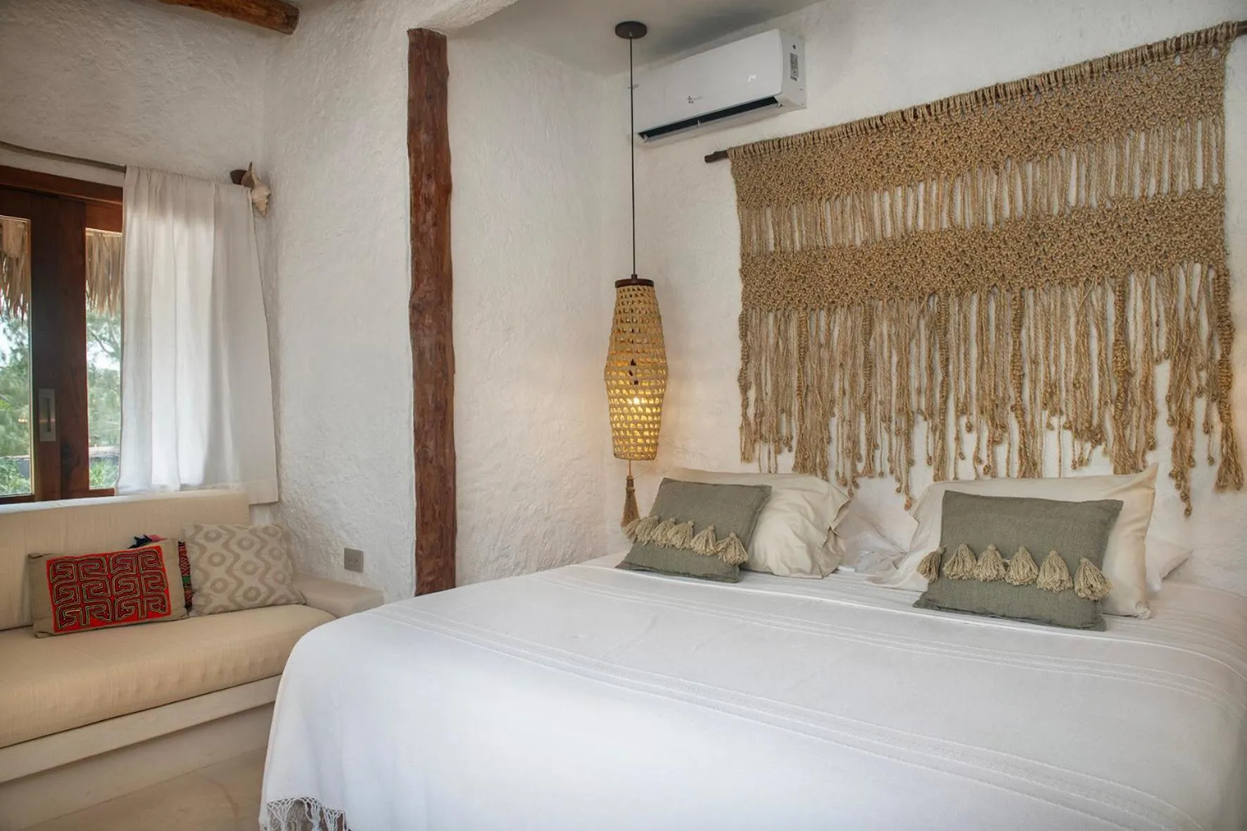 Bed in Mawimbi Boutique Hotel