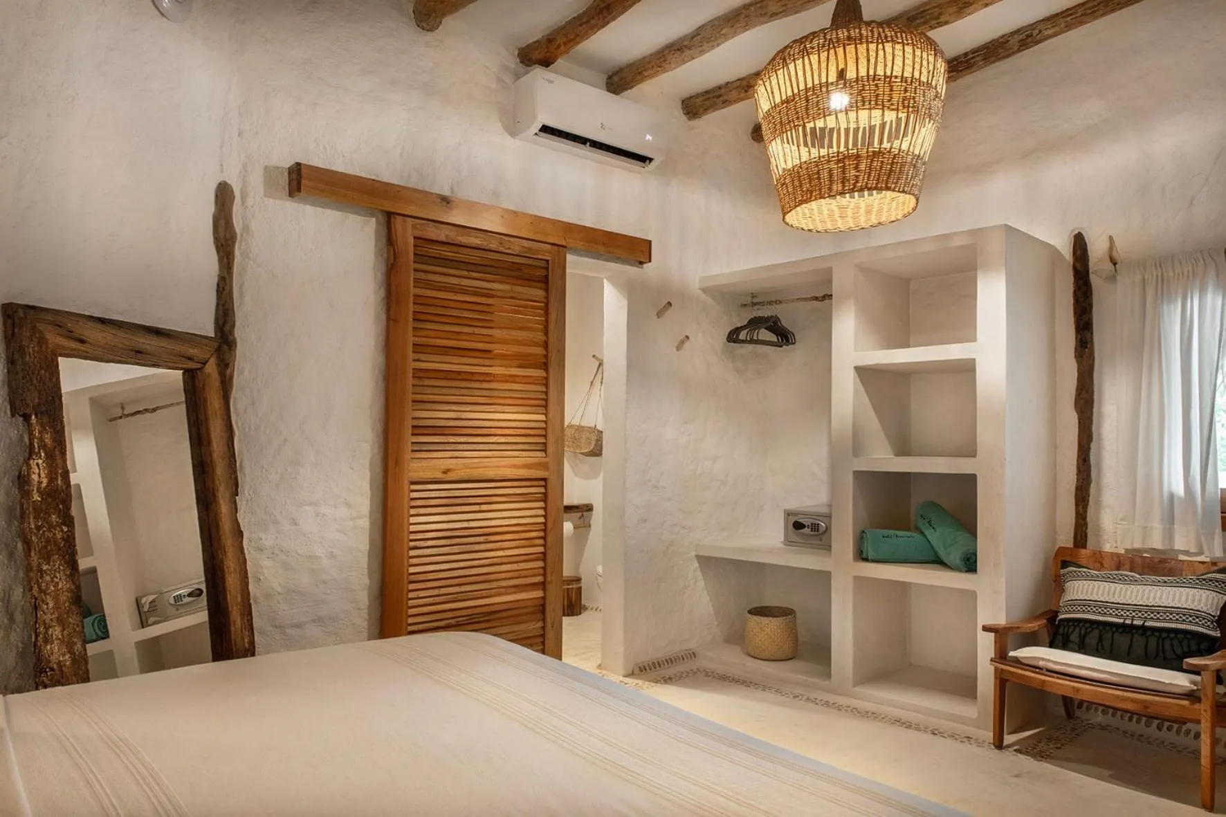 Bed in Mawimbi Boutique Hotel