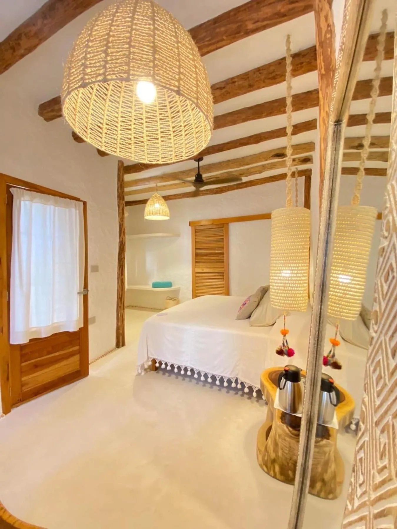 Bed in Mawimbi Boutique Hotel