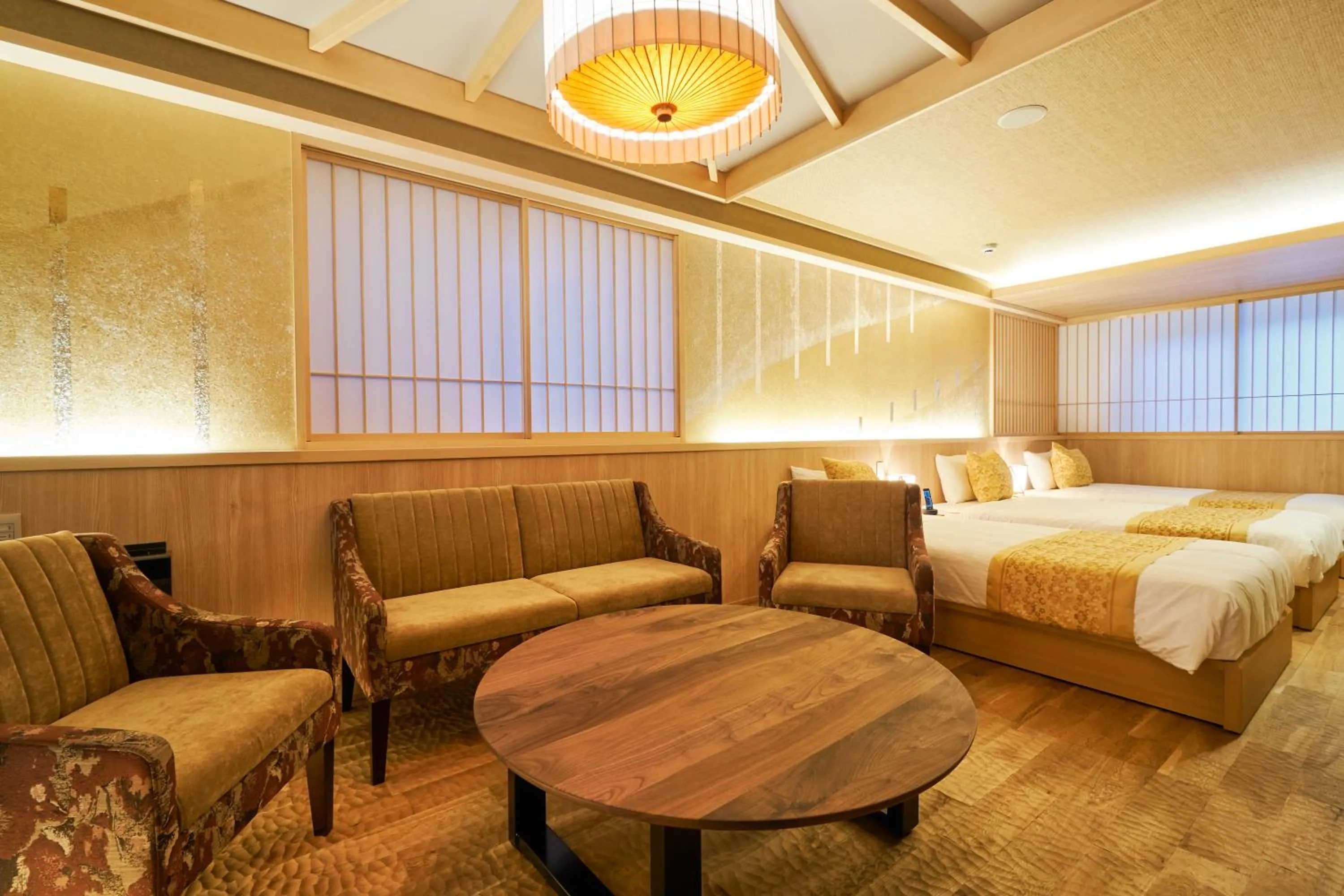 Seating area, Bed in プライベートホテル 四季の彩