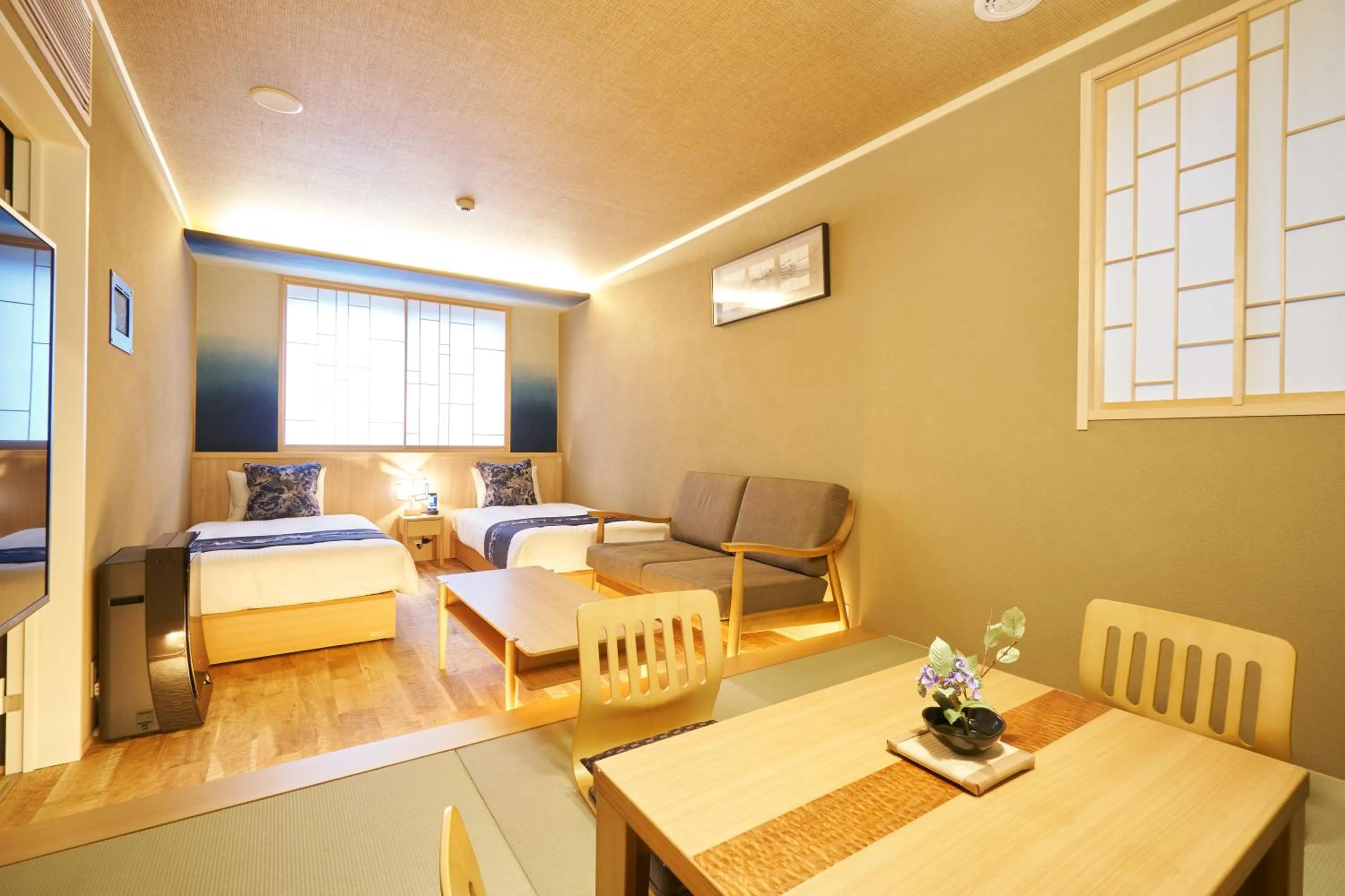 Seating area, Bed in プライベートホテル 四季の彩