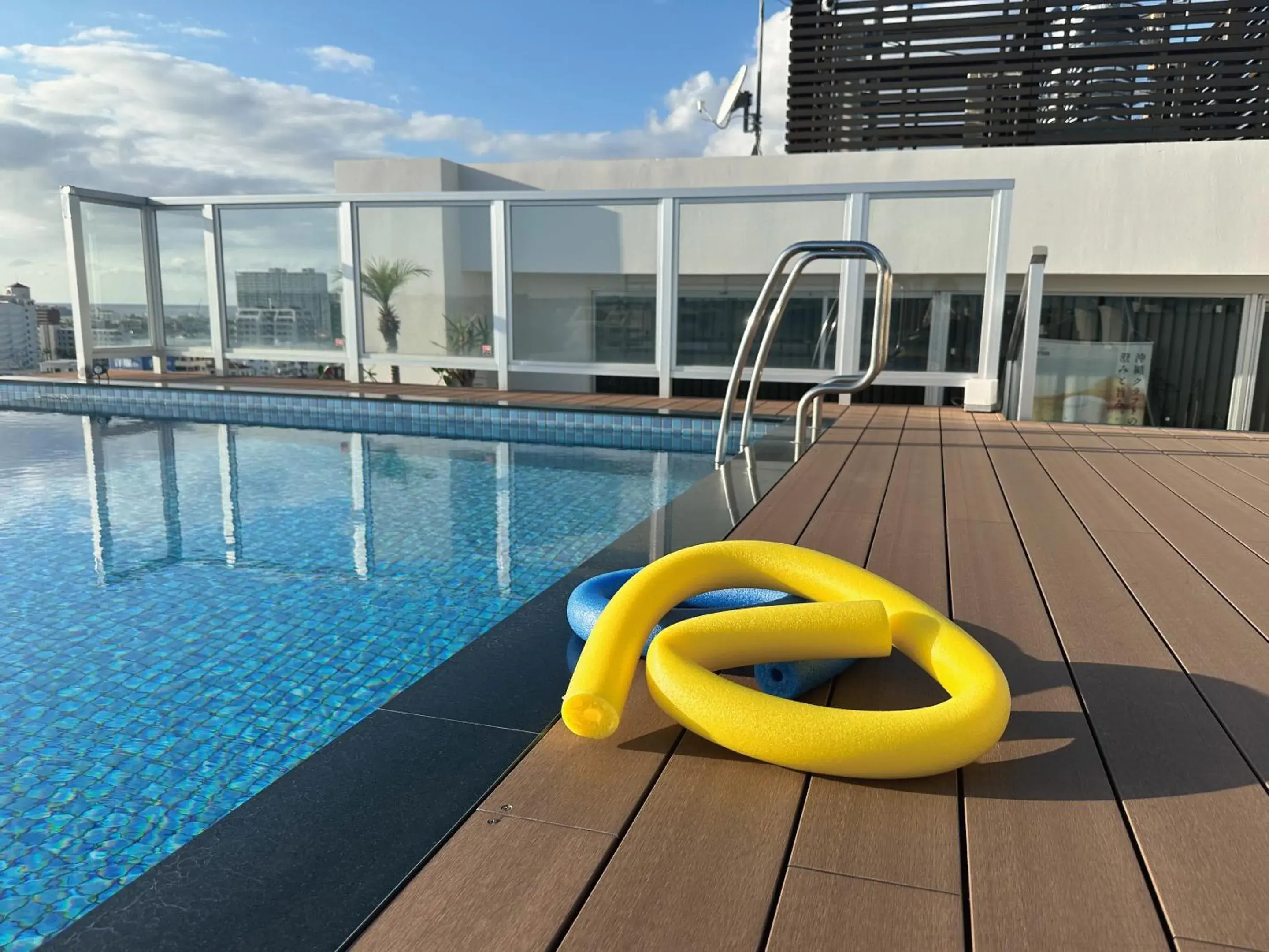 Pool view in Aqua Palace Chatan by Coldio Premium Pool view in Aqua Palace Chatan by Coldio Premium