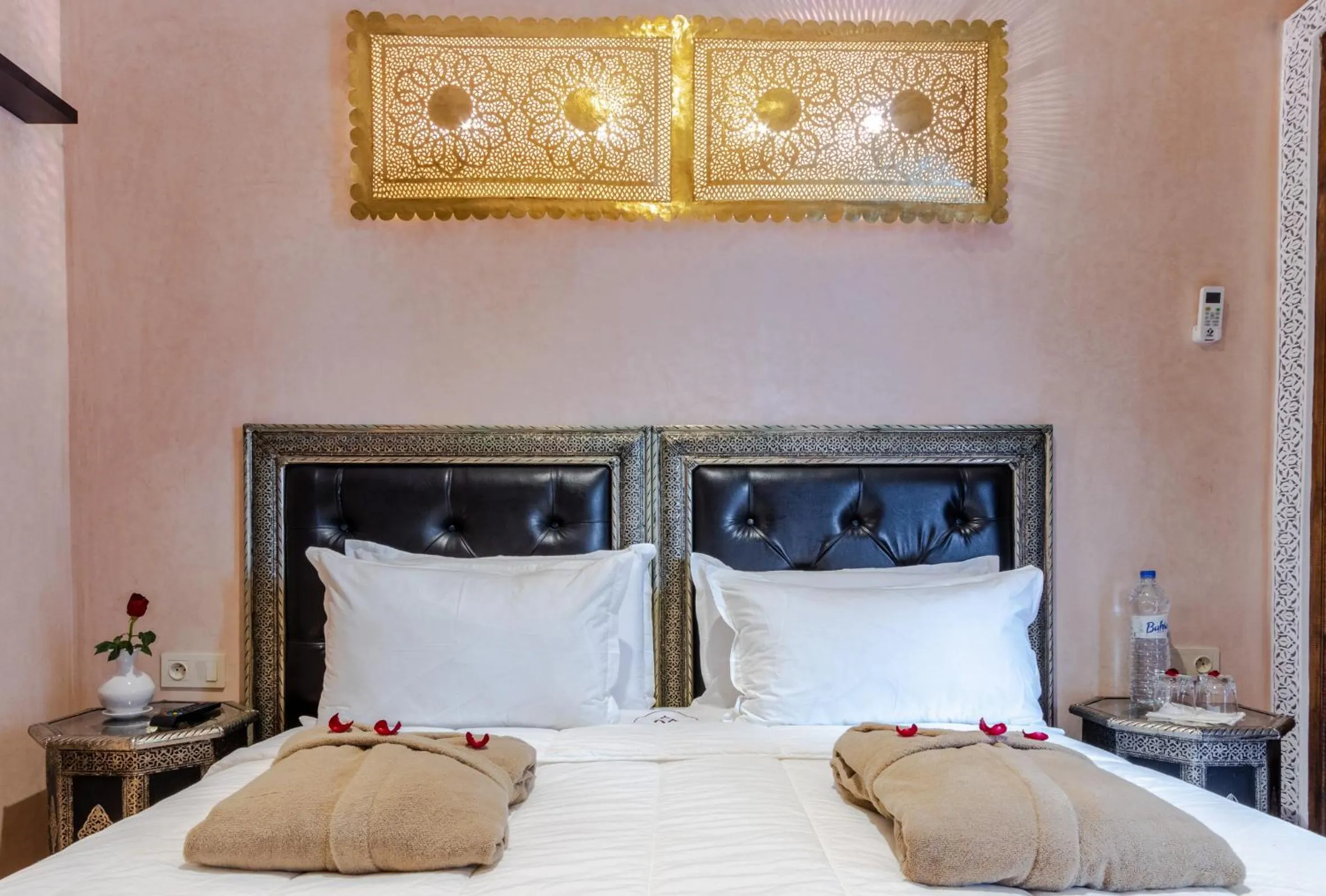 Bed in Riad Medina Art & Suites