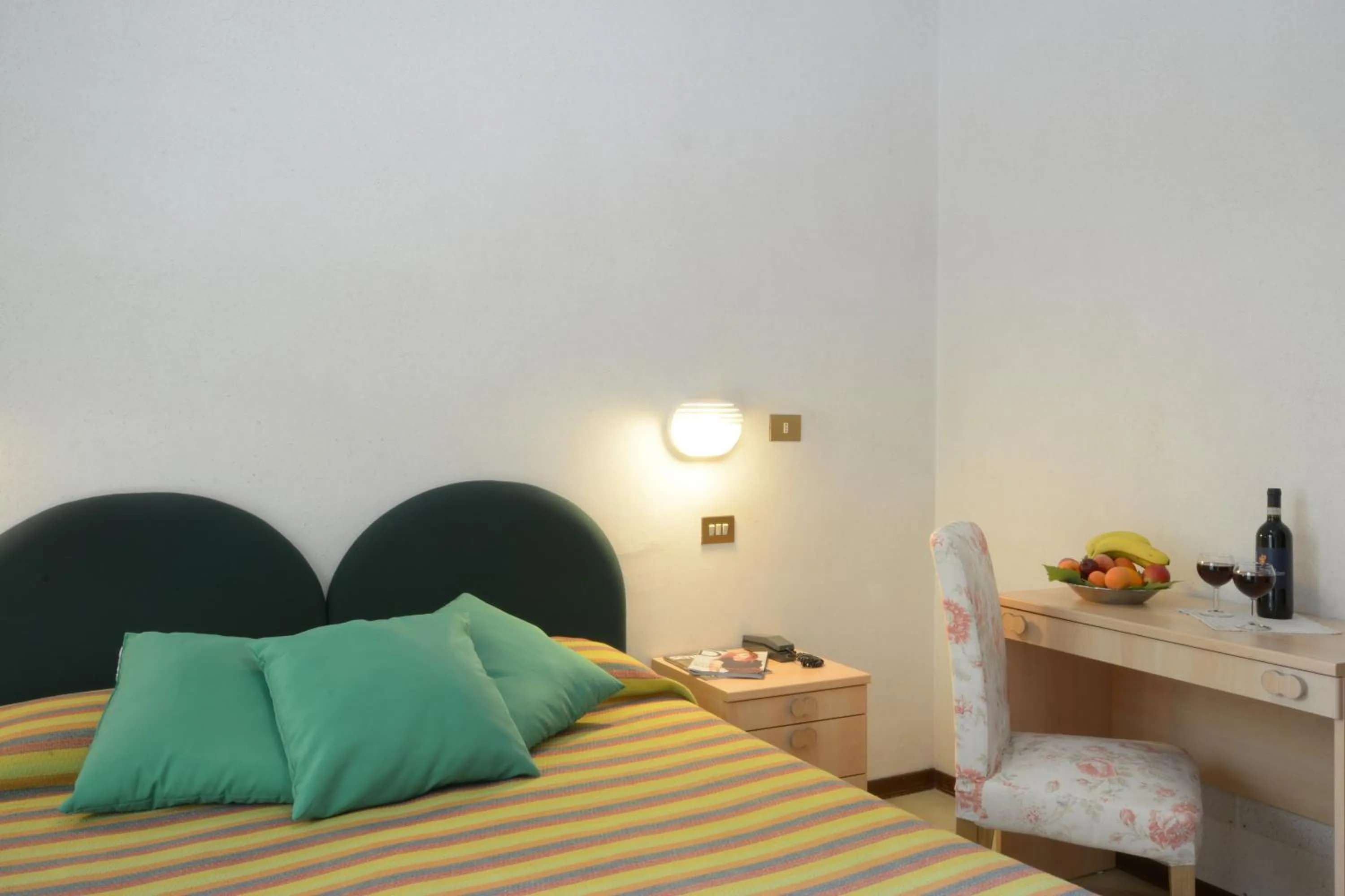 Decorative detail, Bed in Albergo Martini