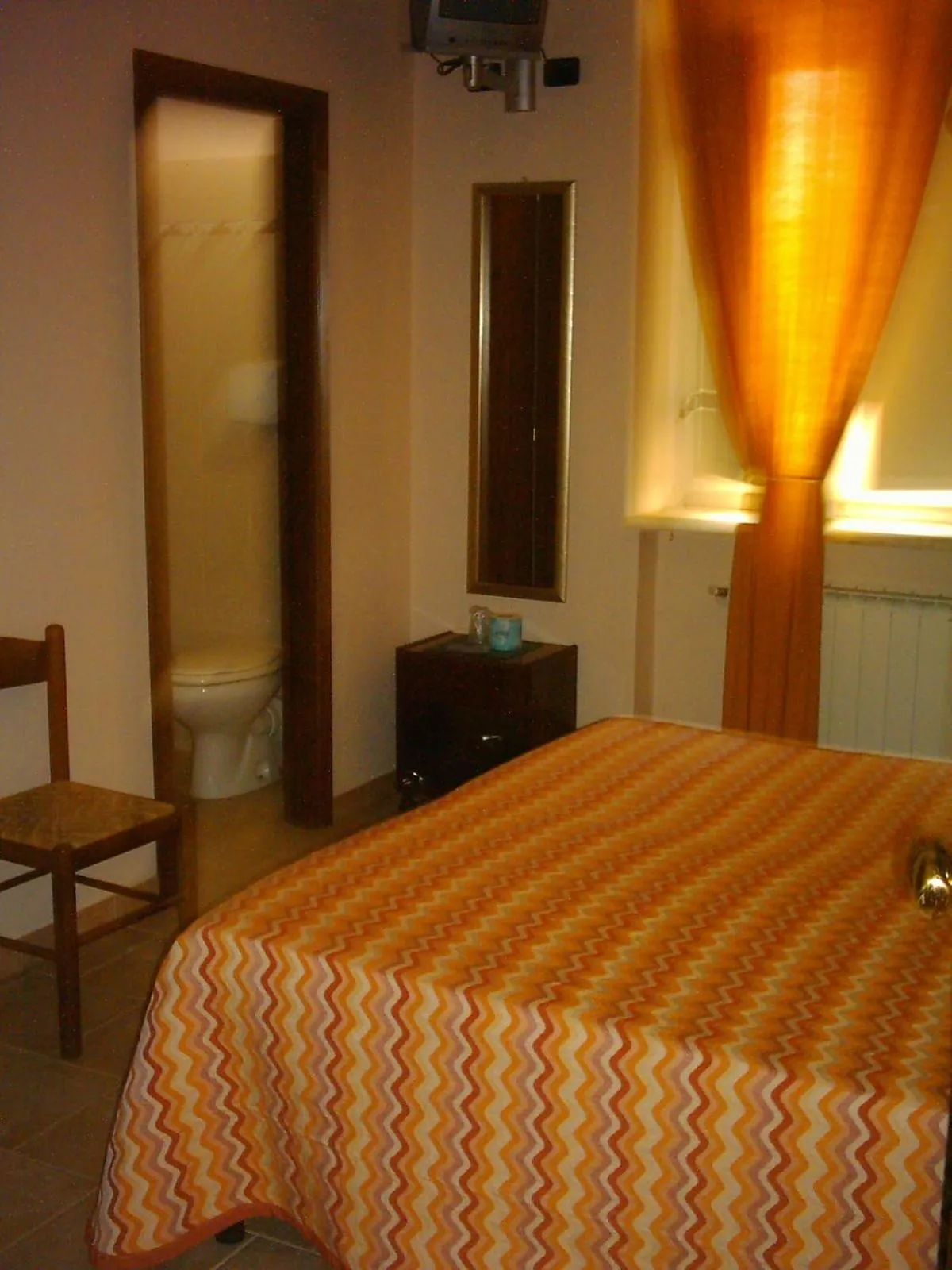 Decorative detail, Bed in Hotel Il Malandrone