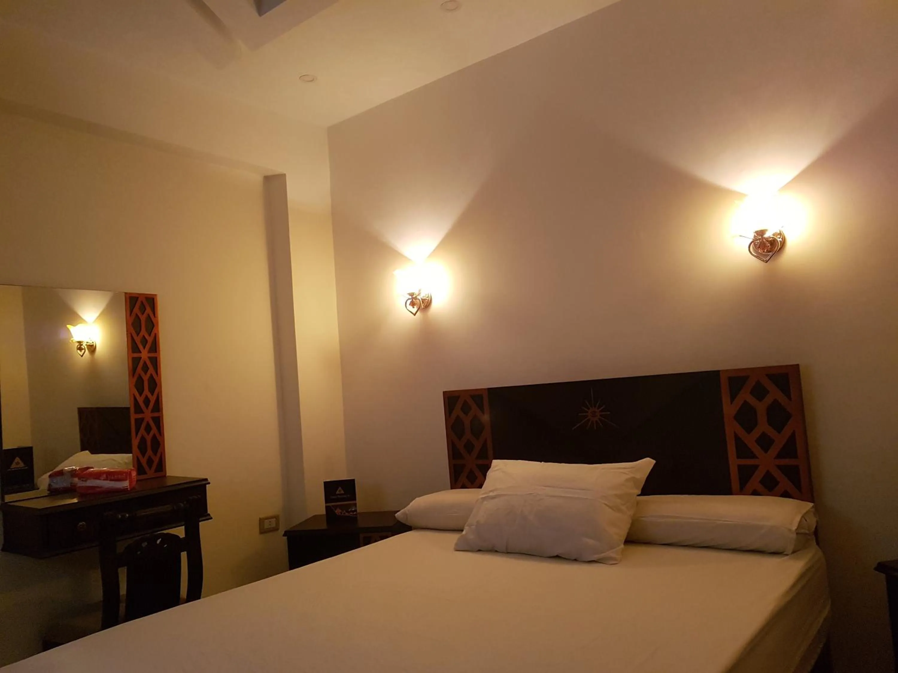 Bed in Sahara Pyramids Inn