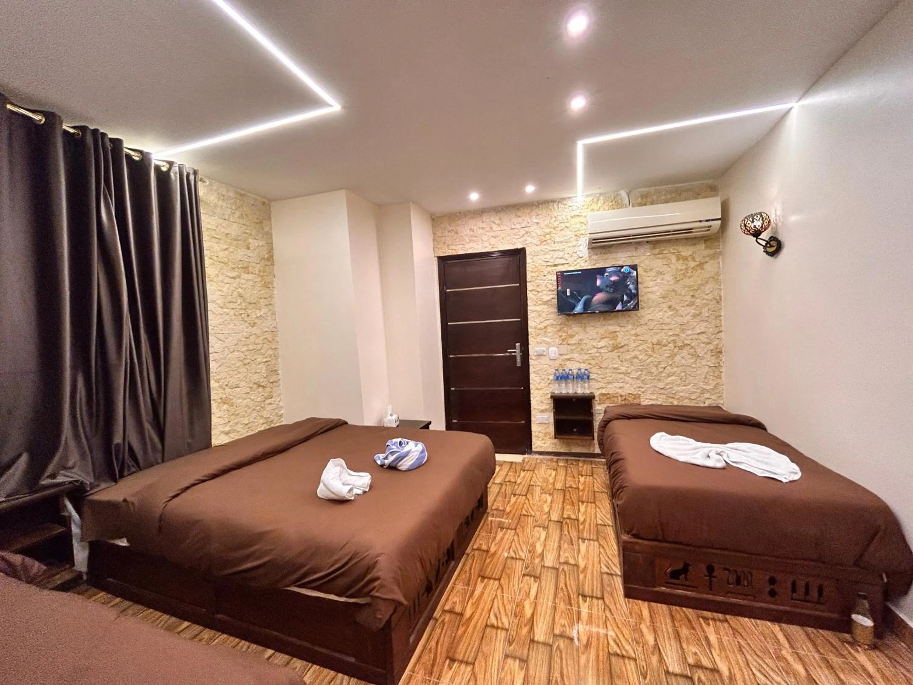 Bed in Sahara Pyramids Inn